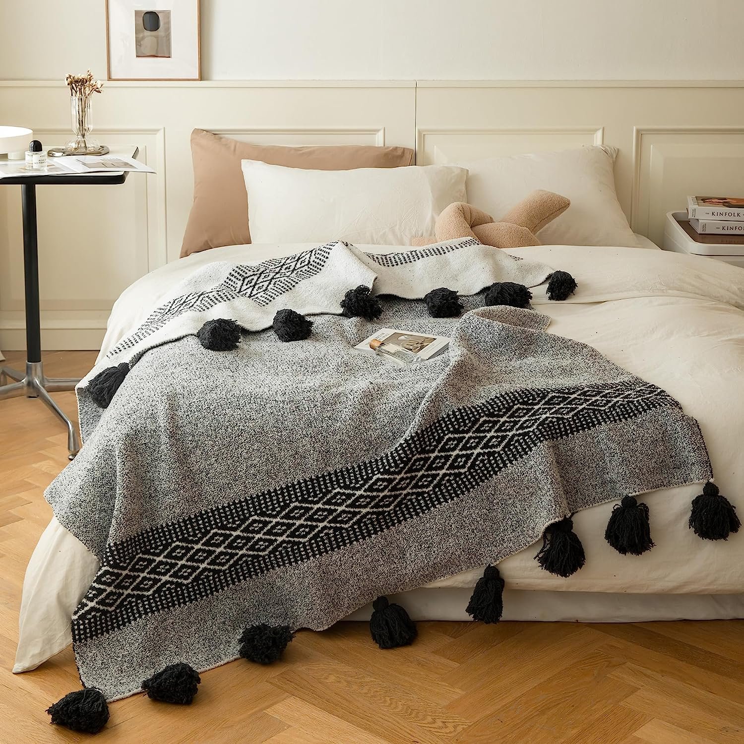 vintage knitted black and white geometric patterned throw with tassels.jpg