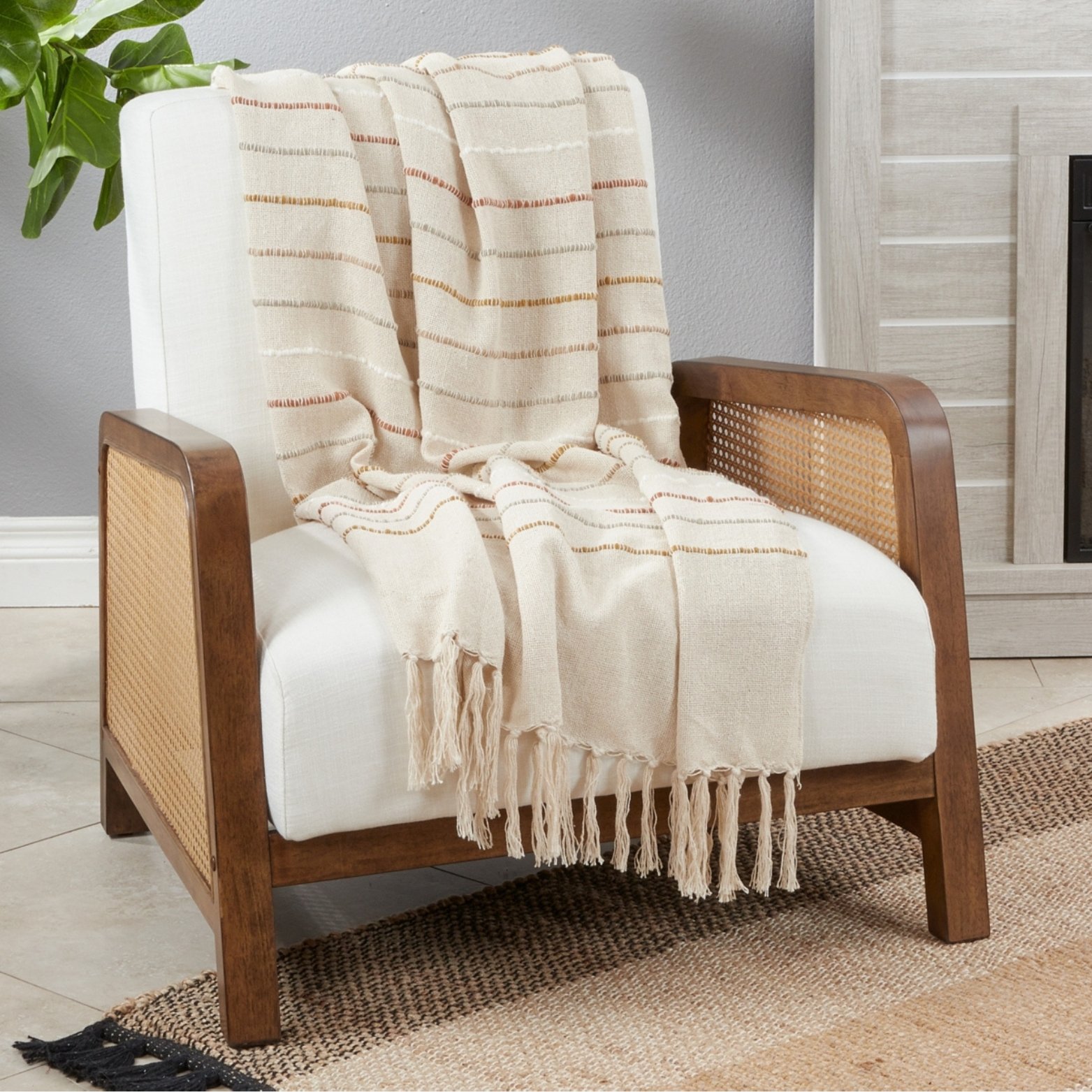Cream Throw Blanket with Embroidered Muted Tones and Tassels.jpg