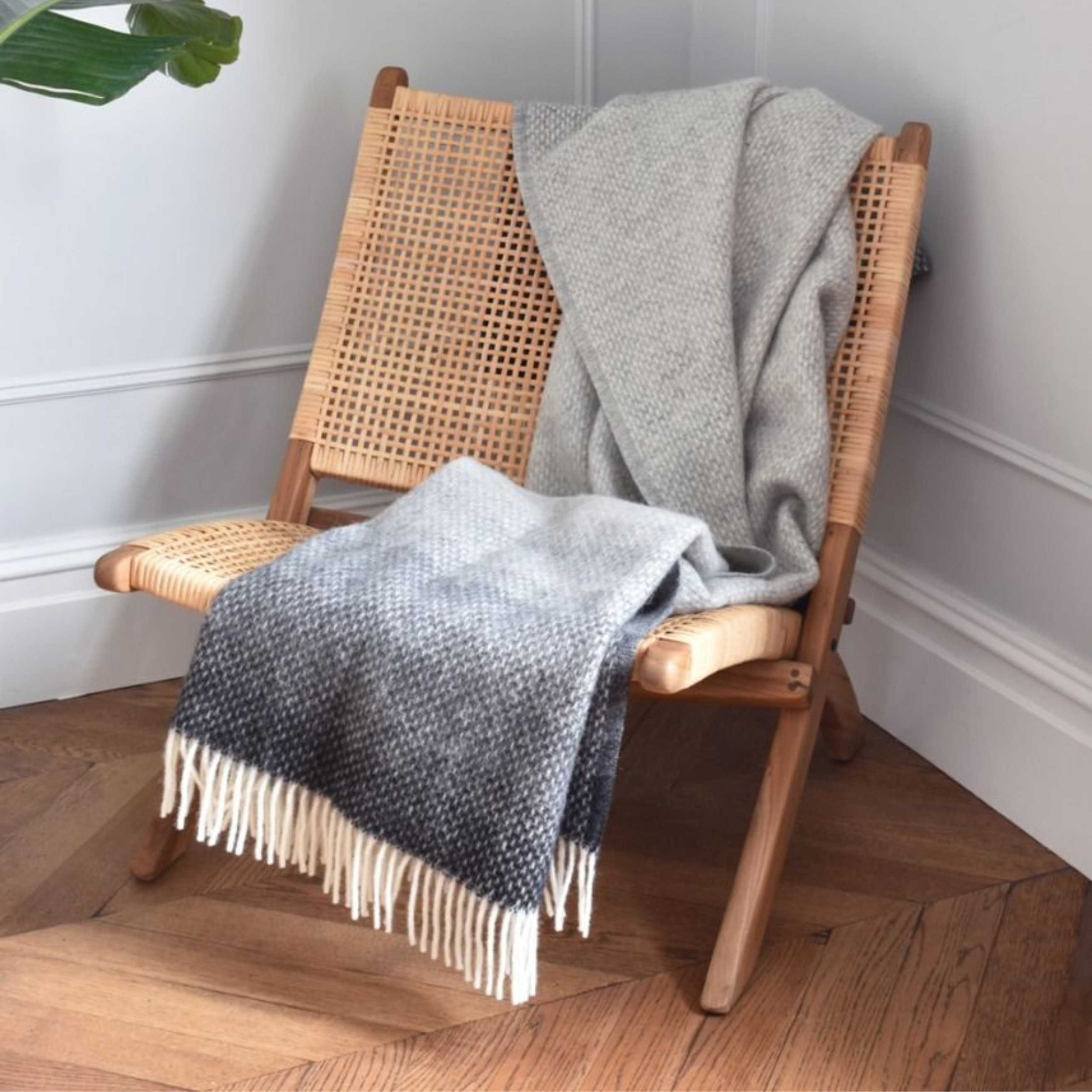 Whicker Chair with Grey Herringbone Blanket.jpg