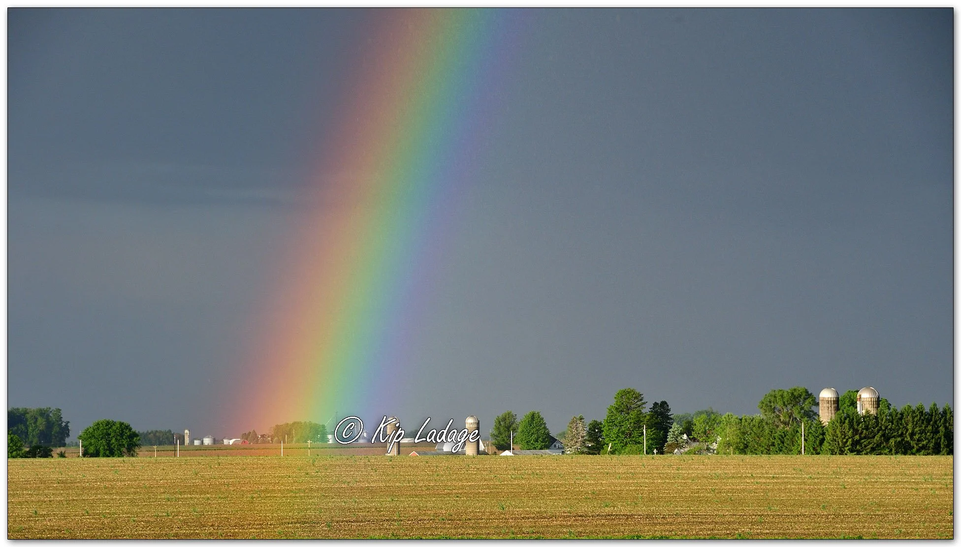 Rainbow Before the Storm at Sunrise - Image 1099673