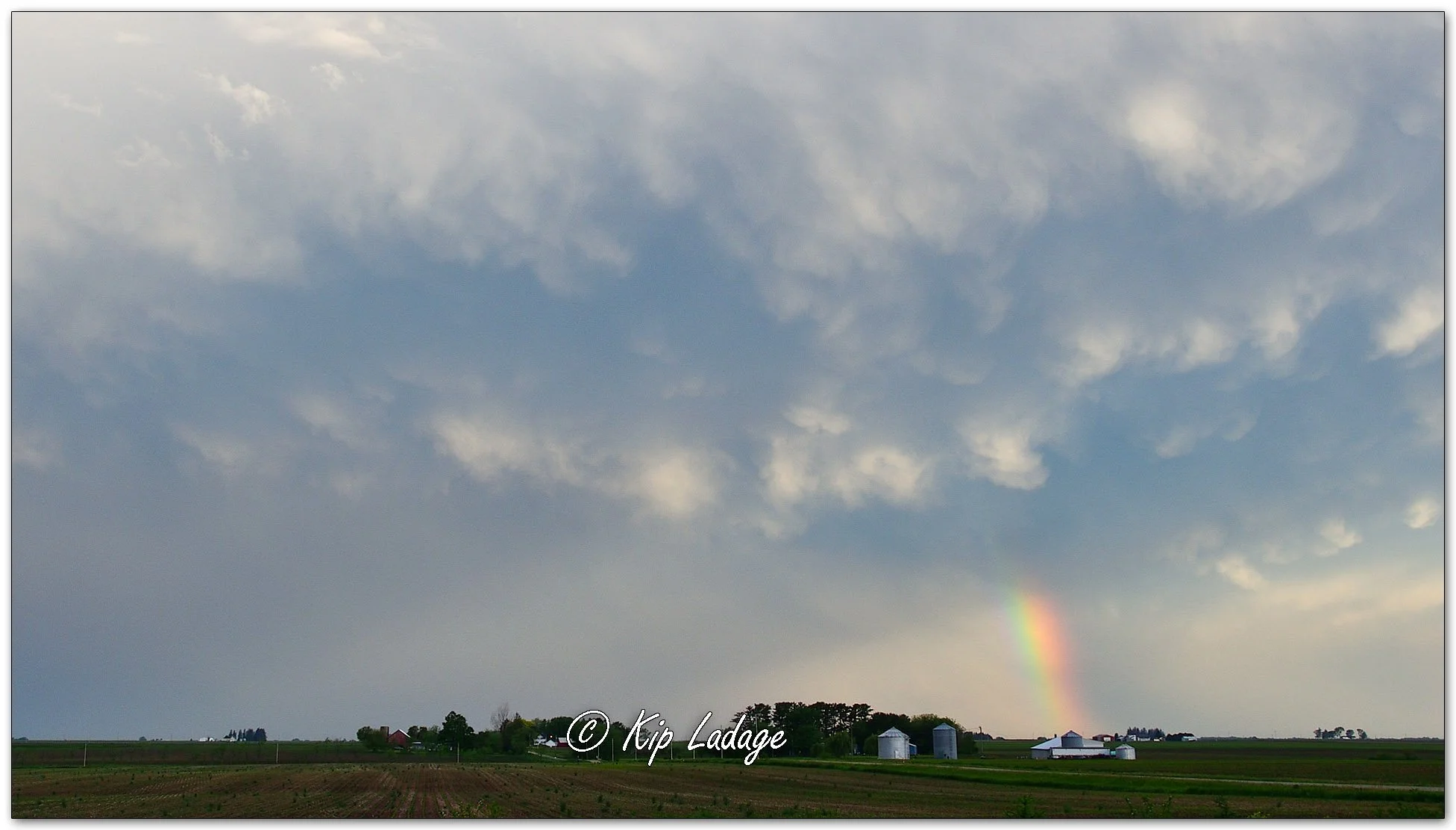 Rainbow Before the Storm at Sunrise - Image 1099624