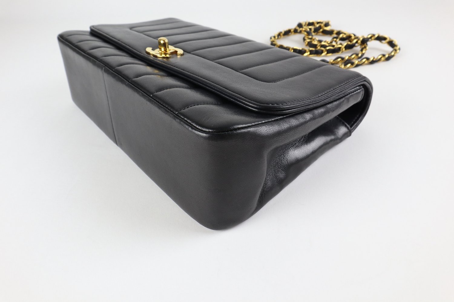 Black Lambskin Vertical Quilted Medium Flap Bag — Elegante Finds