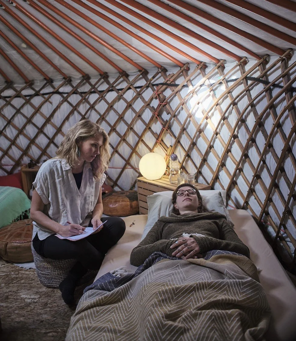 Sonia Sarina Birrer guiding a regression session with a client in her yurt near Bex, Switzerland