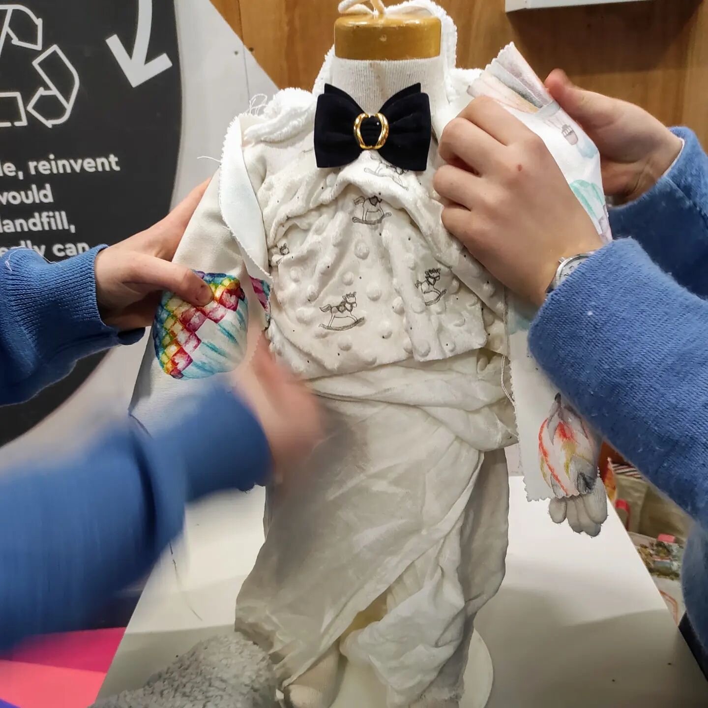 Today everybody had a very creative morning at the Hub Scrapstore . A recycled fashion club at Hazlegrove Prep School in Sparkford visited us during their Eco Festival Week. Together we learnt about different types of fabric, lace and trimmings. At t