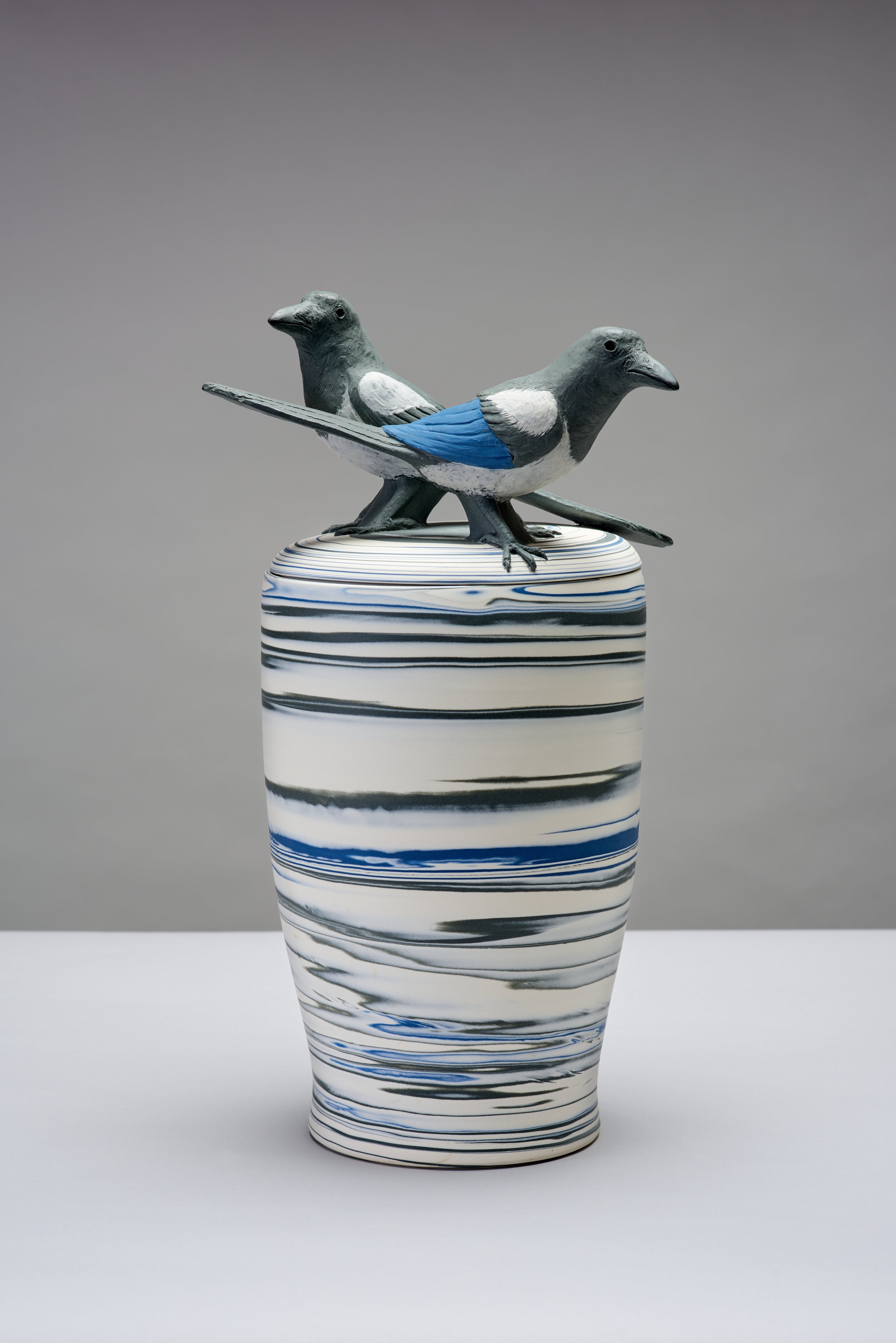 ‘Two for Joy Magpies’. Lidded Vessel. Thrown turned and hand modelled agateware. 
Ht 41cm x 23cm (vessel wd 18cm).