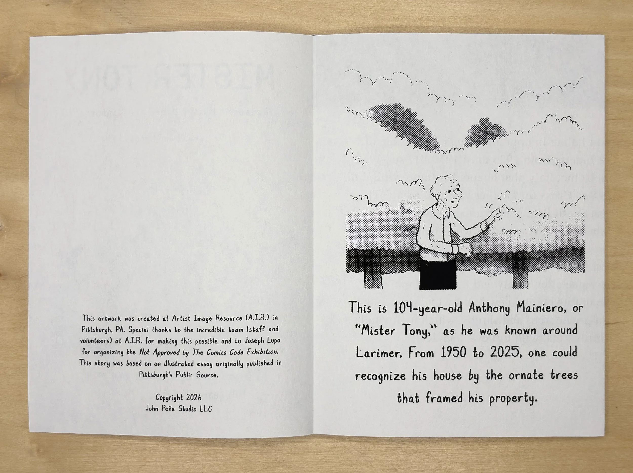 Book opened to first page containing colophon on left page and on right page a drawing a 100 year old man presenting trees he cultivated.