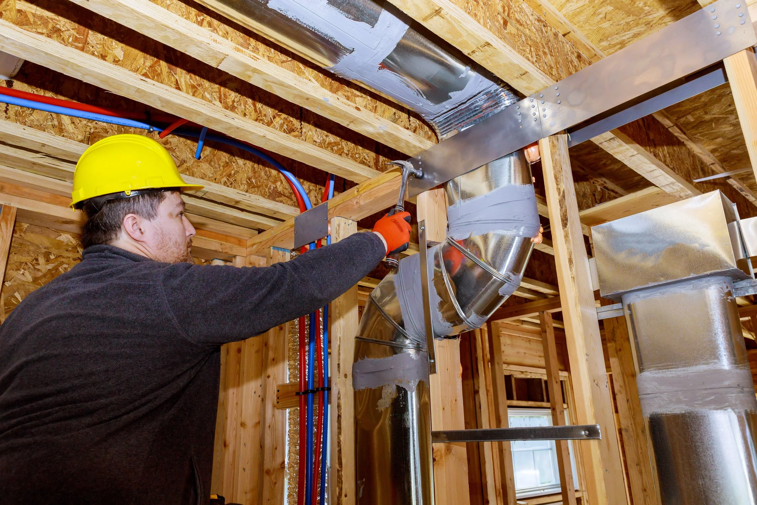 workers-making-final-air-duct-conditioning-hvac-sy-2022-08-01-04-00-13-utc.jpg