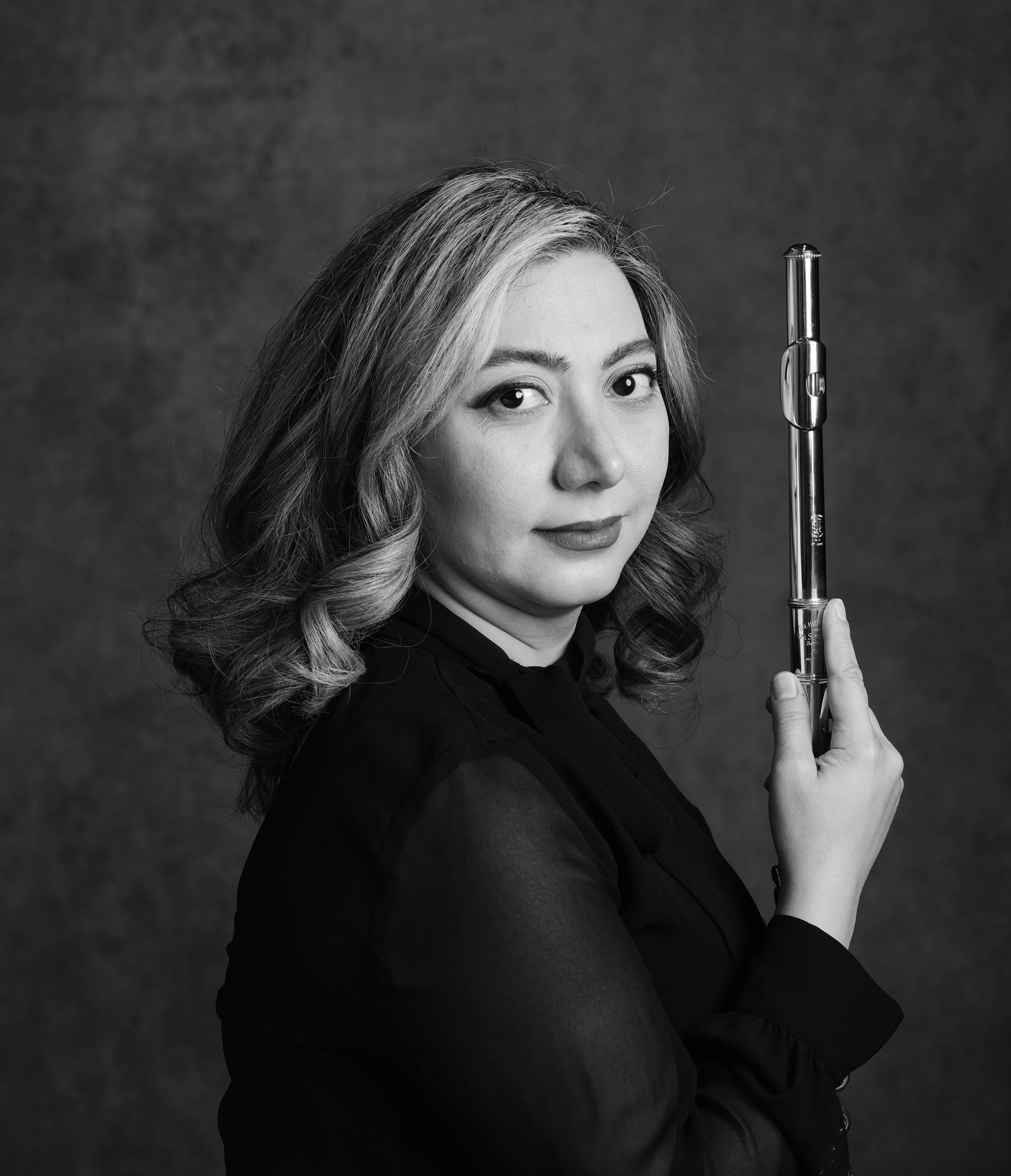 Dr. Kelariz Keshavarz is Assistant Professor of Flute at the University of North Carolina at Chapel Hill. Her work centers on contemporary flute repertoire and cross-cultural practice, with a focus on commissioning and promoting new music.
She is the