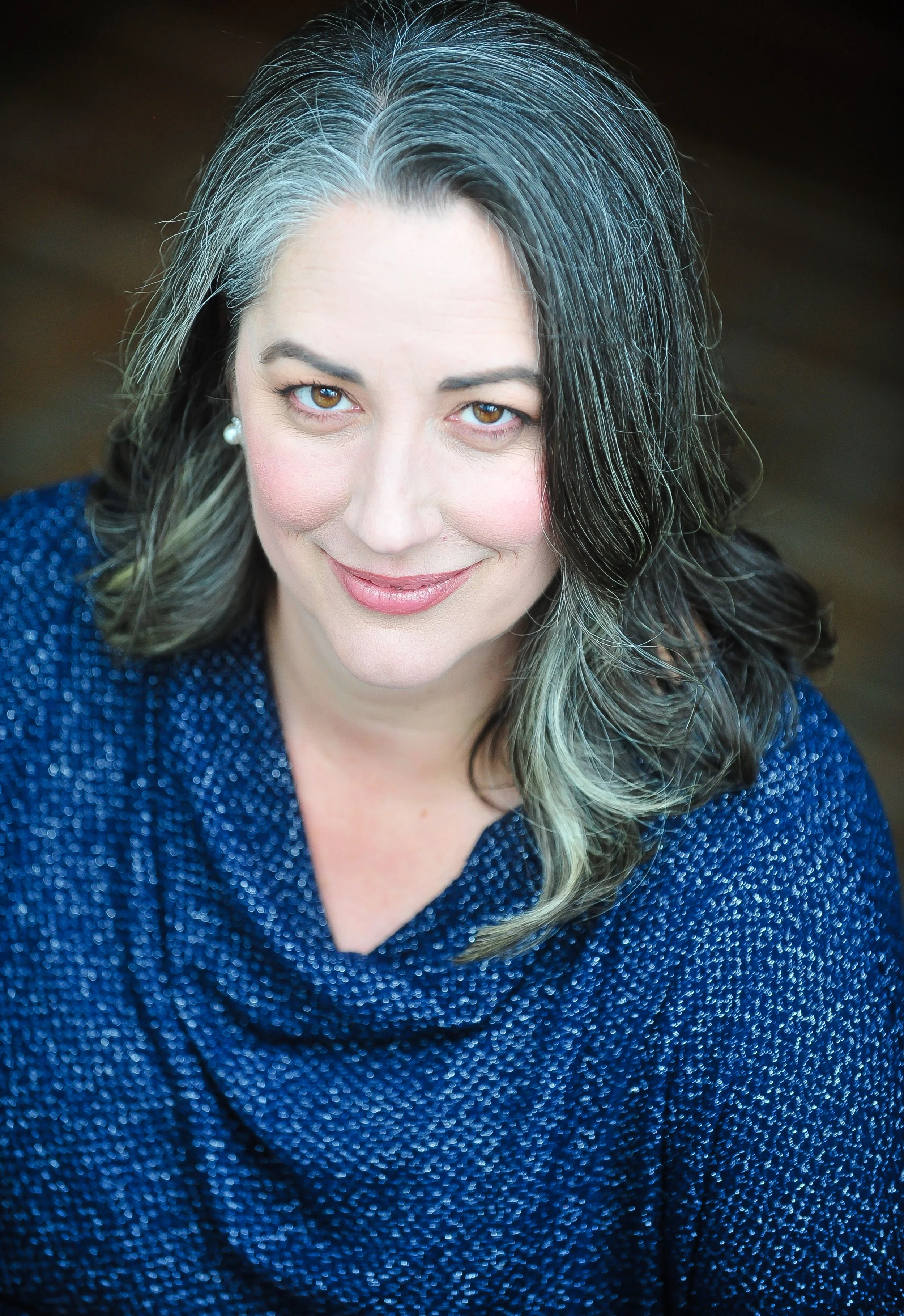 SHARON O’CONNELL CAMPBELL (she/her), mezzo-soprano, frequently
performs (often premiering) newly composed works. As a collaborator in
innovative staged art song concerts, she has performed across the United
States. She also is at home in opera, conce