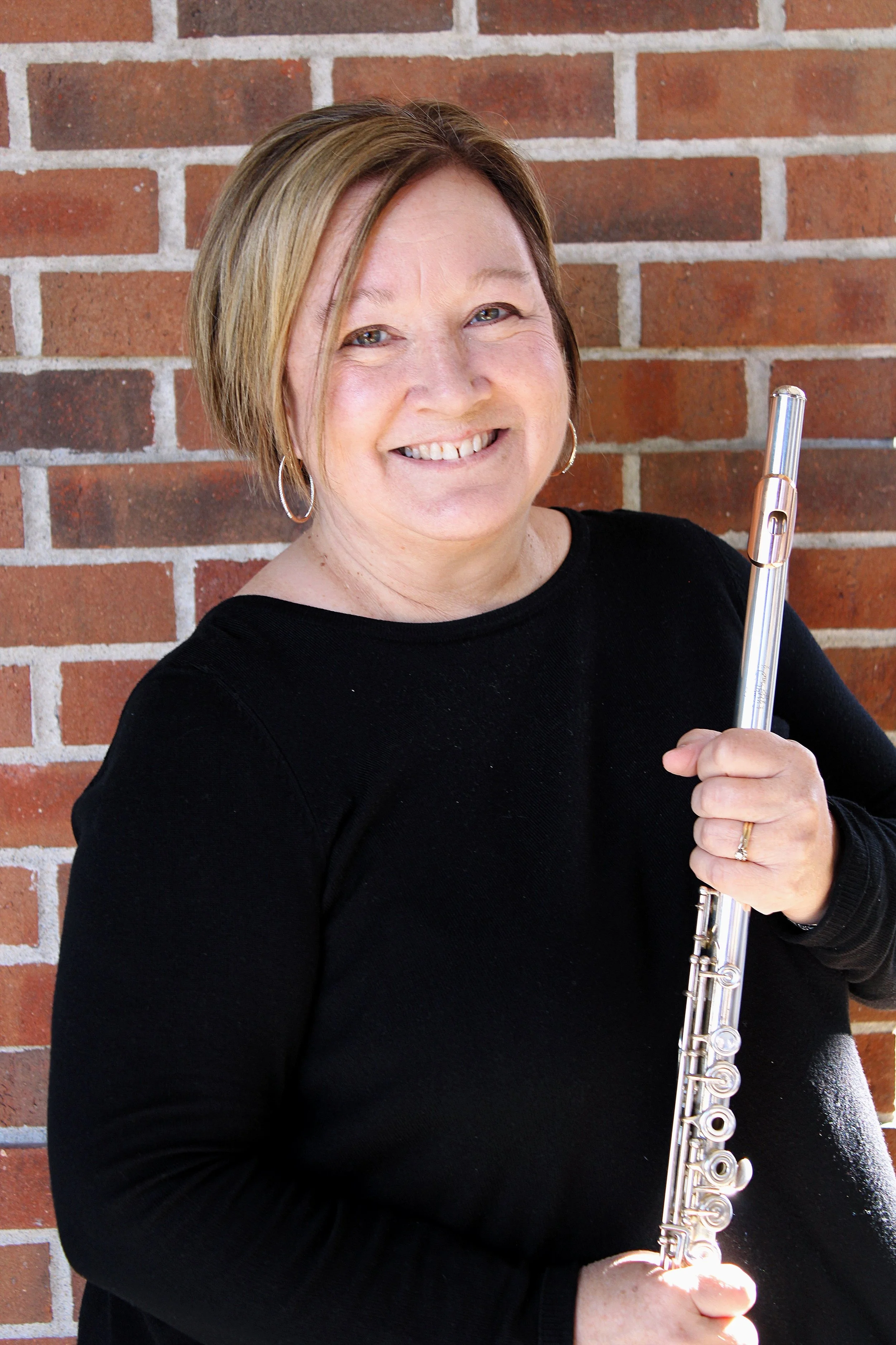 Gina Hart-Kemper is a performer, teacher and clinician in the Kansas City metro area. A
graduate of Wichita State University, Gina continued her education earning the Master of
Music and Doctoral of Musical Arts degrees at The University of Michigan.