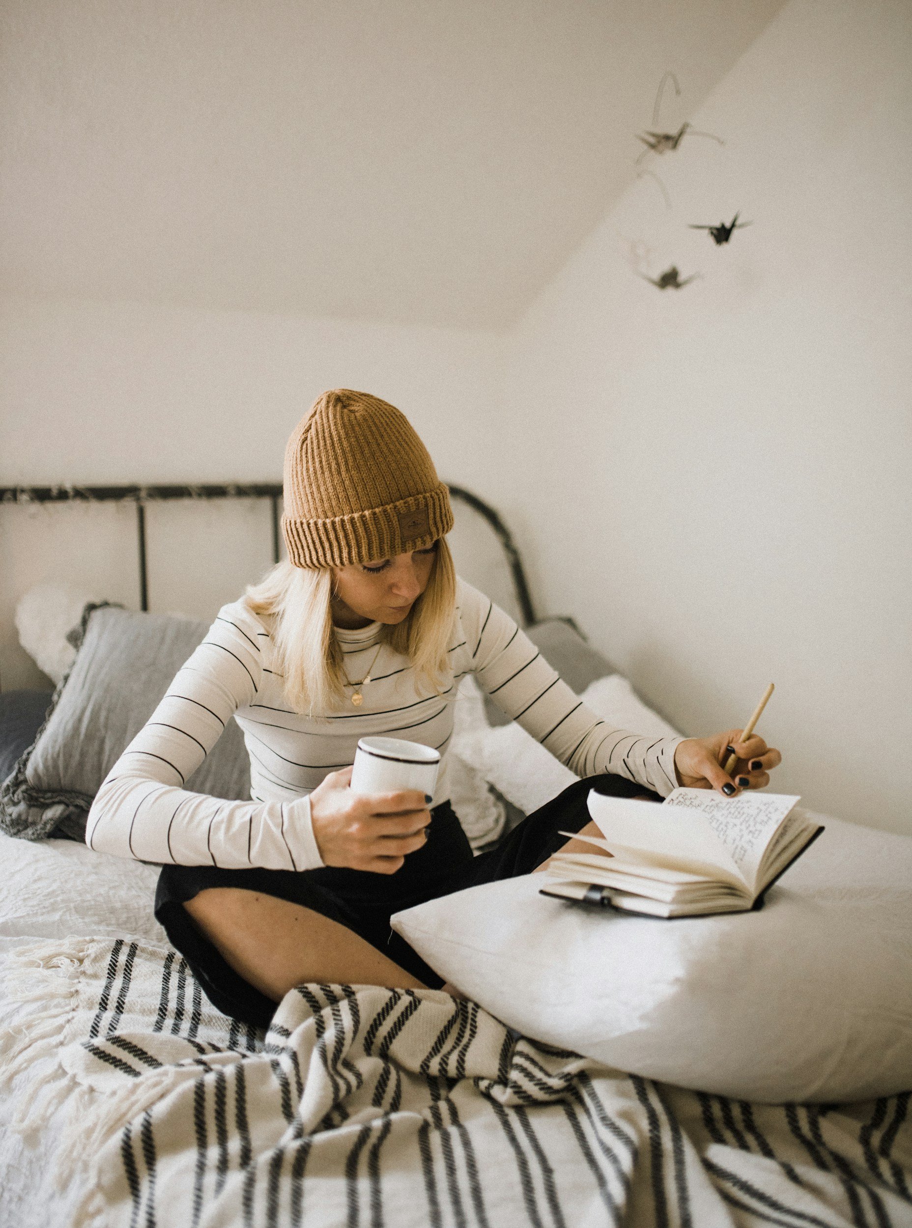 Woman sitting peacefully, quieting racing thoughts and finding emotional calm.
