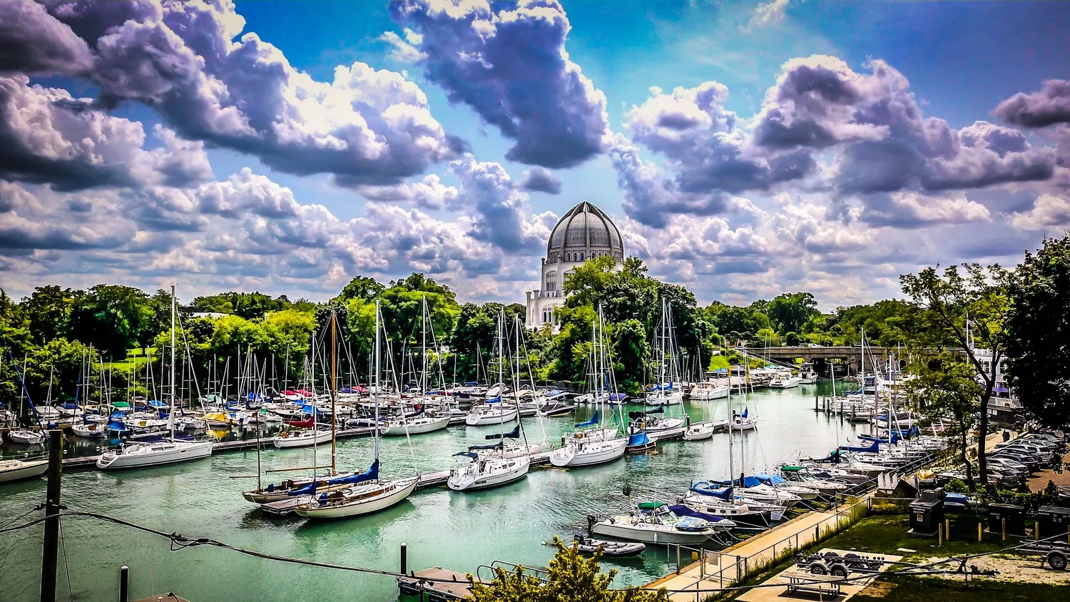 Aerial view of a marina and sailboats photographed by True North Lens