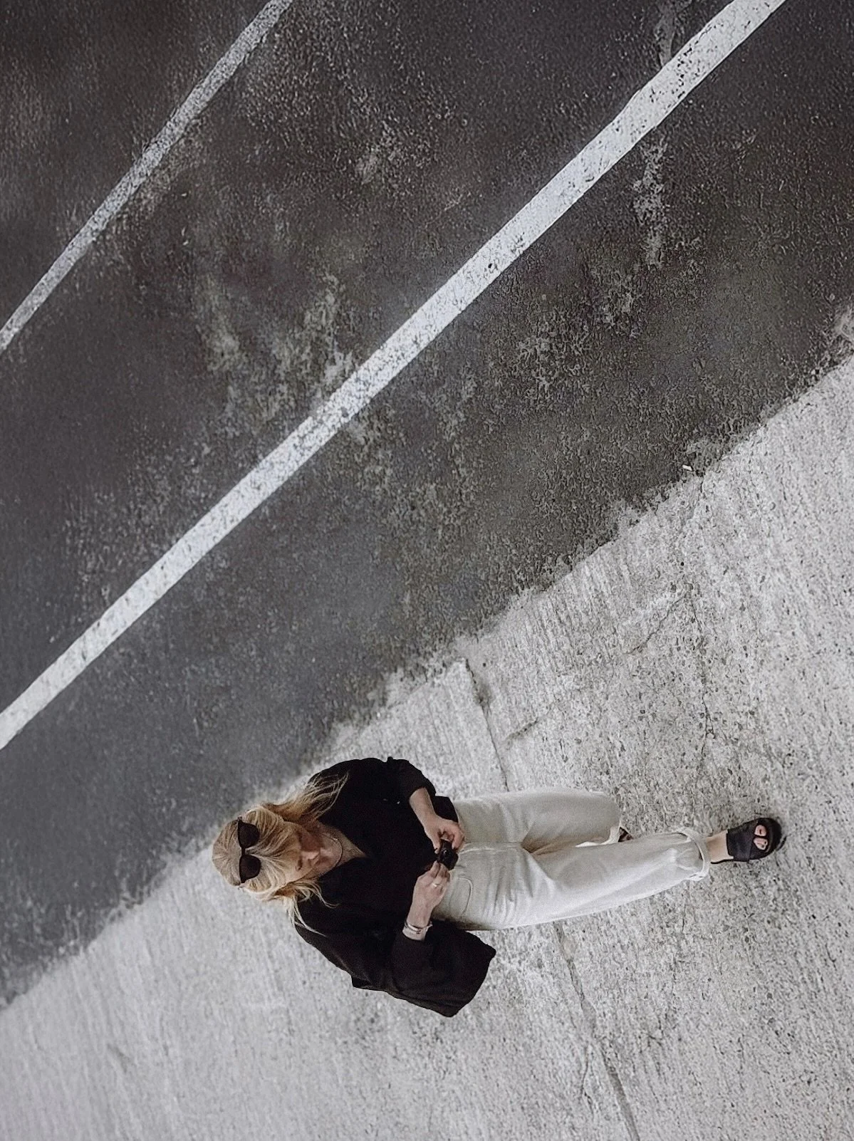 pause and progress at once.

lines divide not to separate 
but to shift perspective

lines look clear from above 
but clarity isn&rsquo;t about control
it&rsquo;s about attention

in between one thing and 
the next standing slightly 
sideways to it a