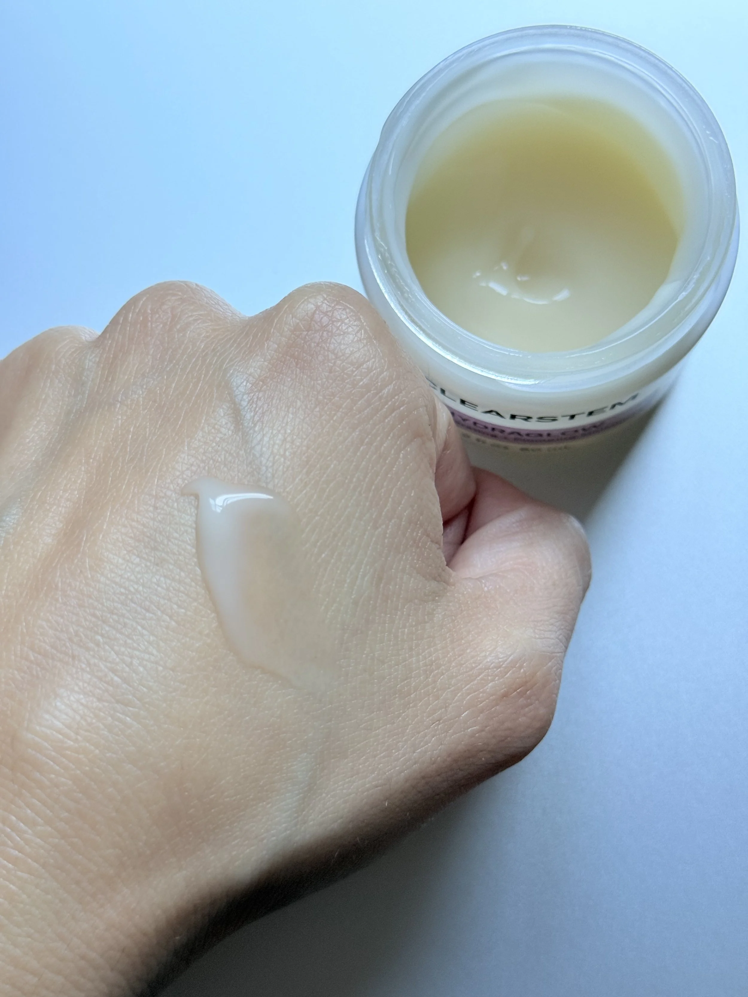 Clearstem HYDRAGLOW jelly-cream swatch on the back of a hand