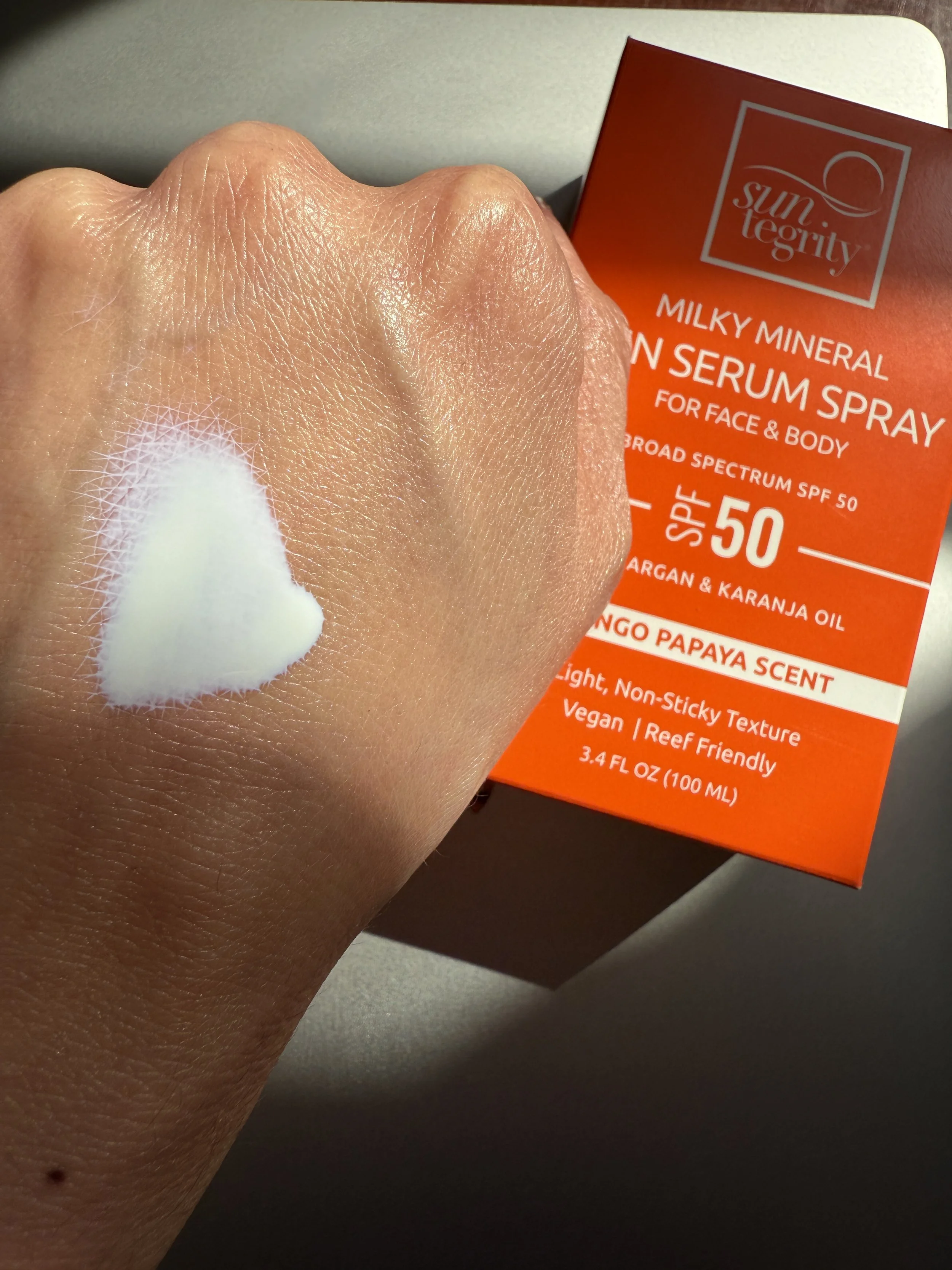 Suntegrity Milky Mineral Sun Serum Spray SPF 50 Texture