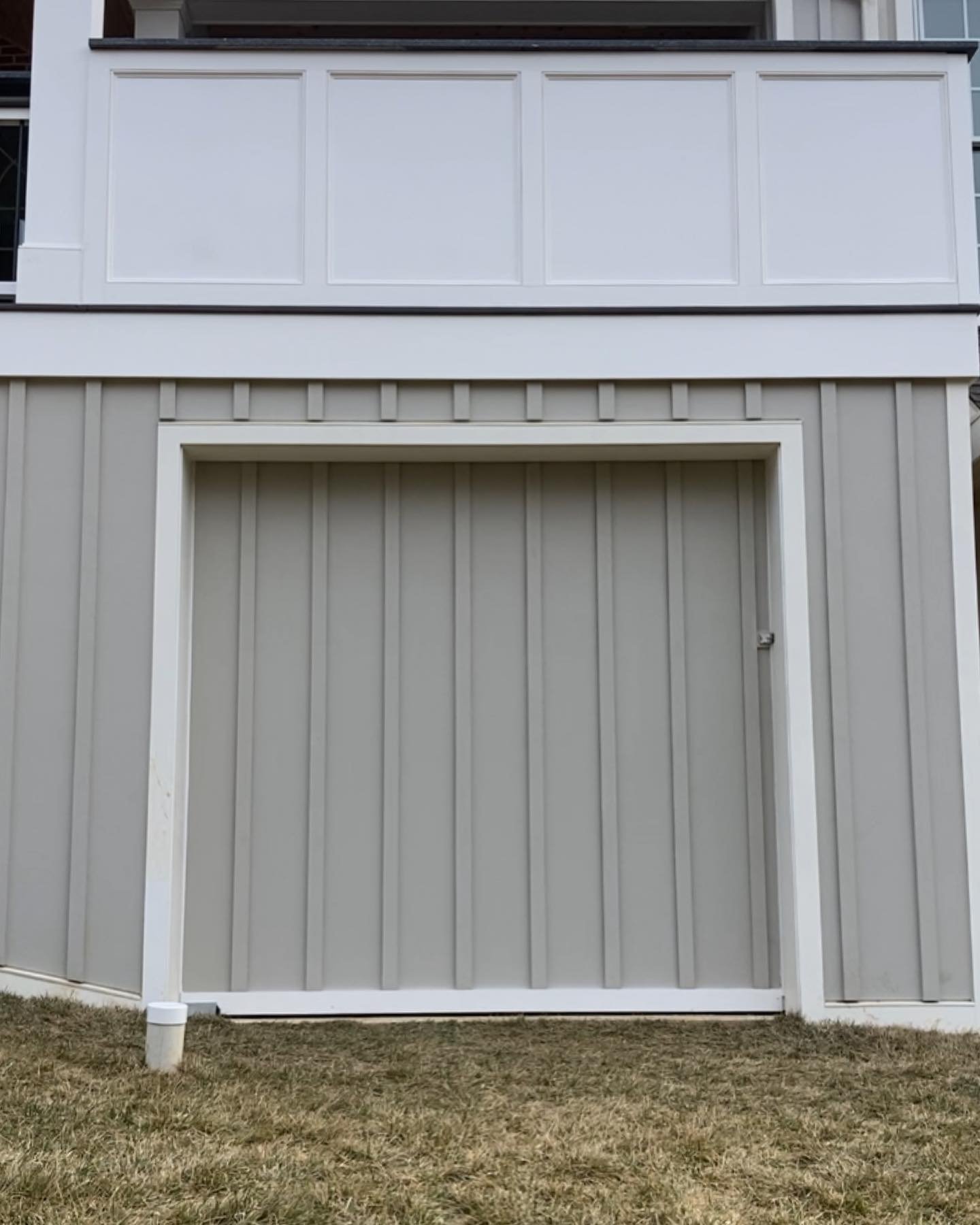 Large barn door for a storage area under a covered deck. #carpentry #design