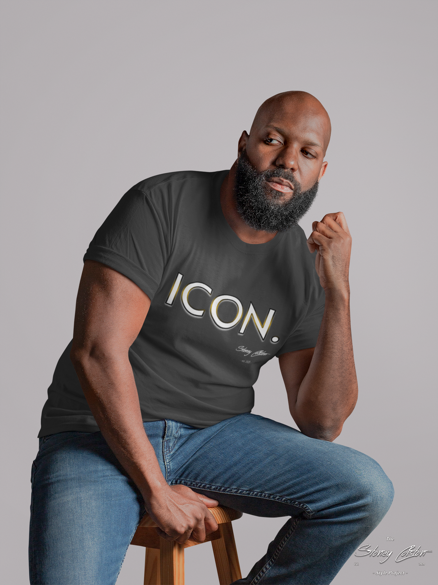 t-shirt-mockup-of-a-thoughtful-man-sitting-on-a-chair-21535 (5).png