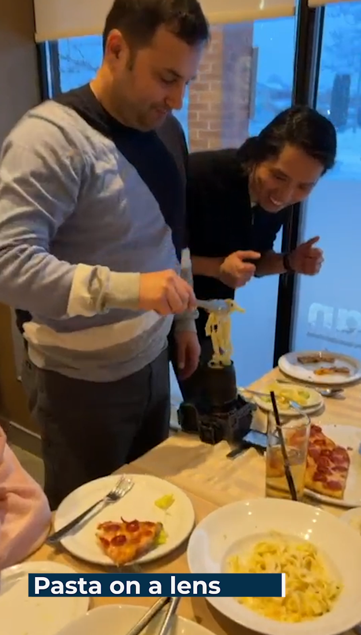 Putting pasta on my camera.