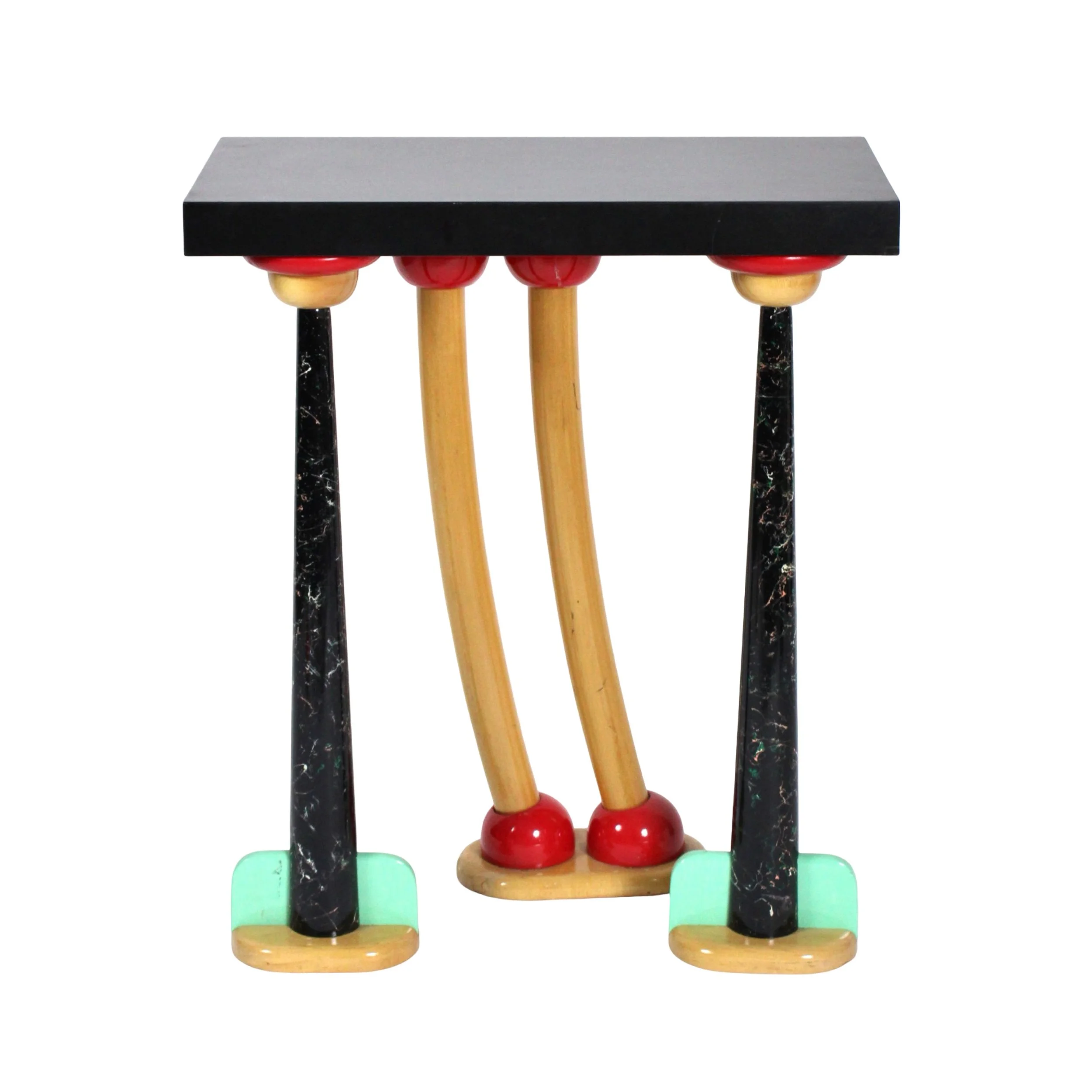 Tall postmodern console table with ablack top, two parallel curved light wood colored legs in the back capped on ends with red half spheres and two tapered black and teal speckle painted legs in front