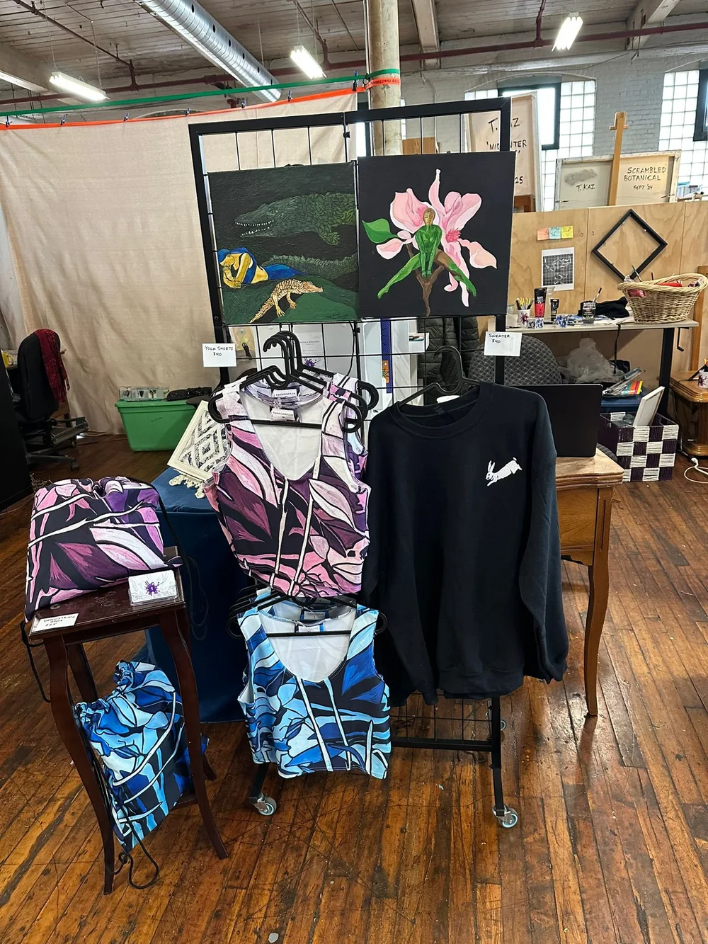 Handmade merchandise display at an art fair