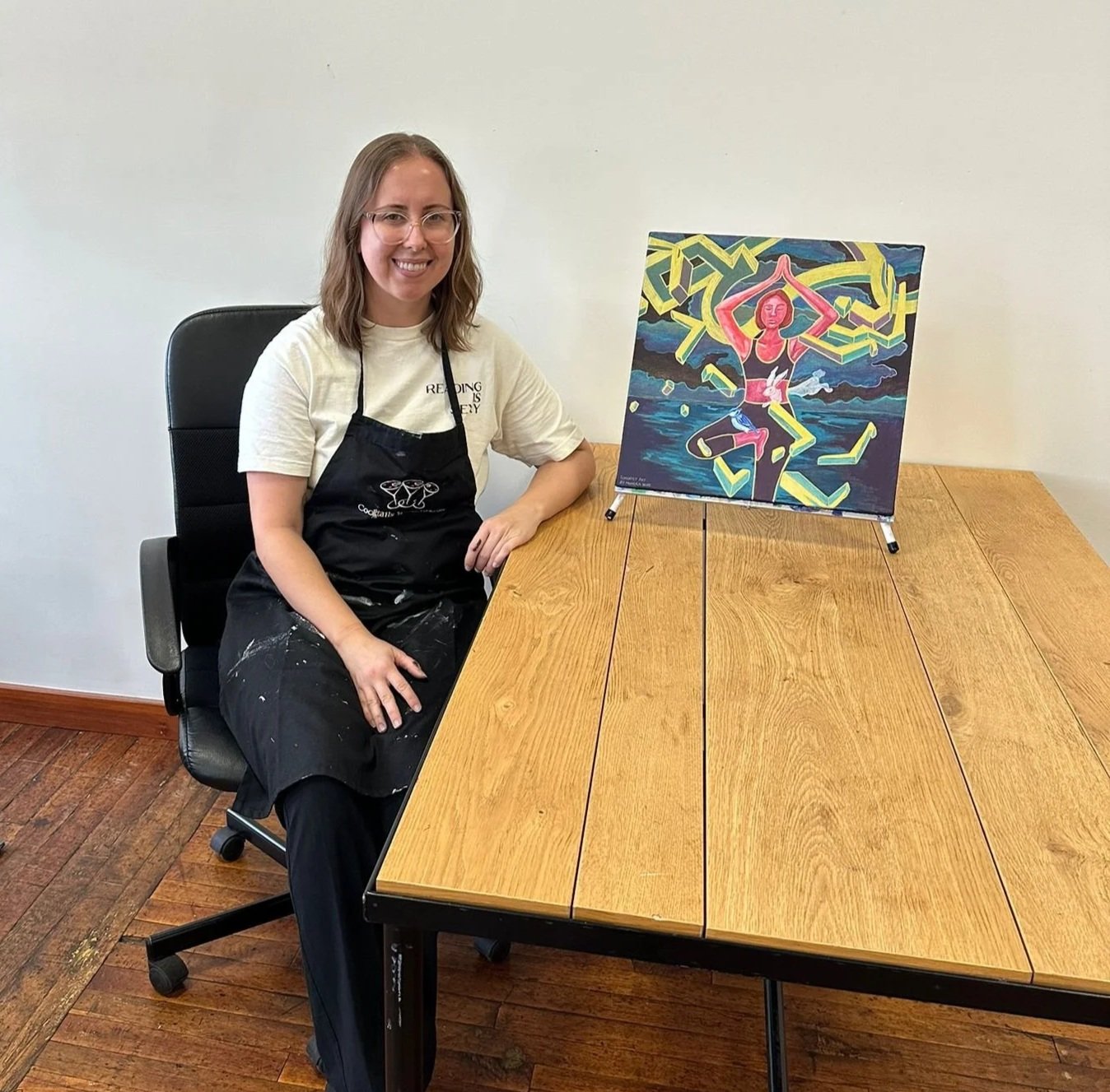 Monoica Brinkman with recent painting titled "Voice meets Truth"