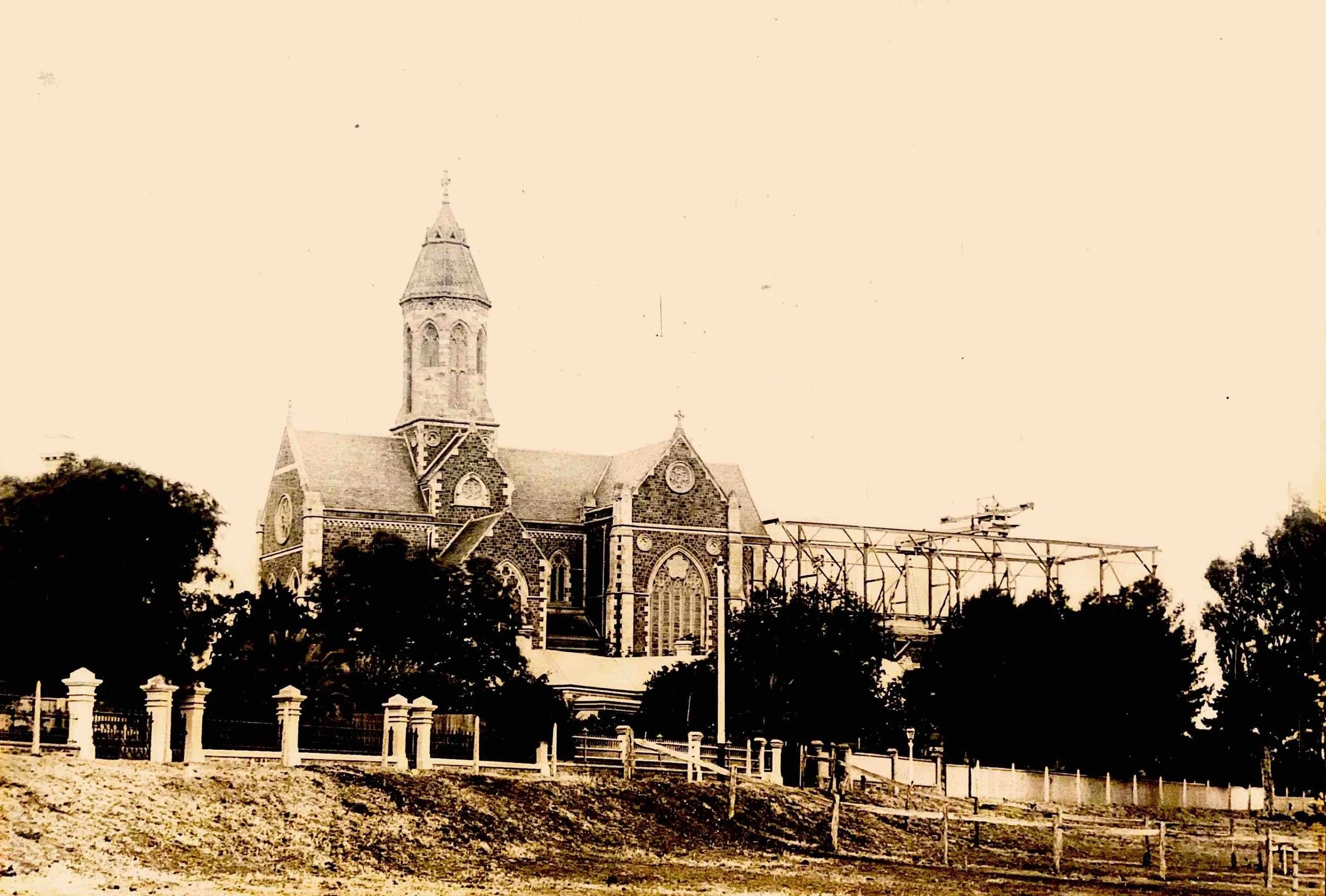 7. The Nave Extension circa 1894 - The gantry with the crane used in building the extension. The first part of the cathedral was built with Tea Tree Gully sandstone similar to that in the G.P.O. and Town Hall.