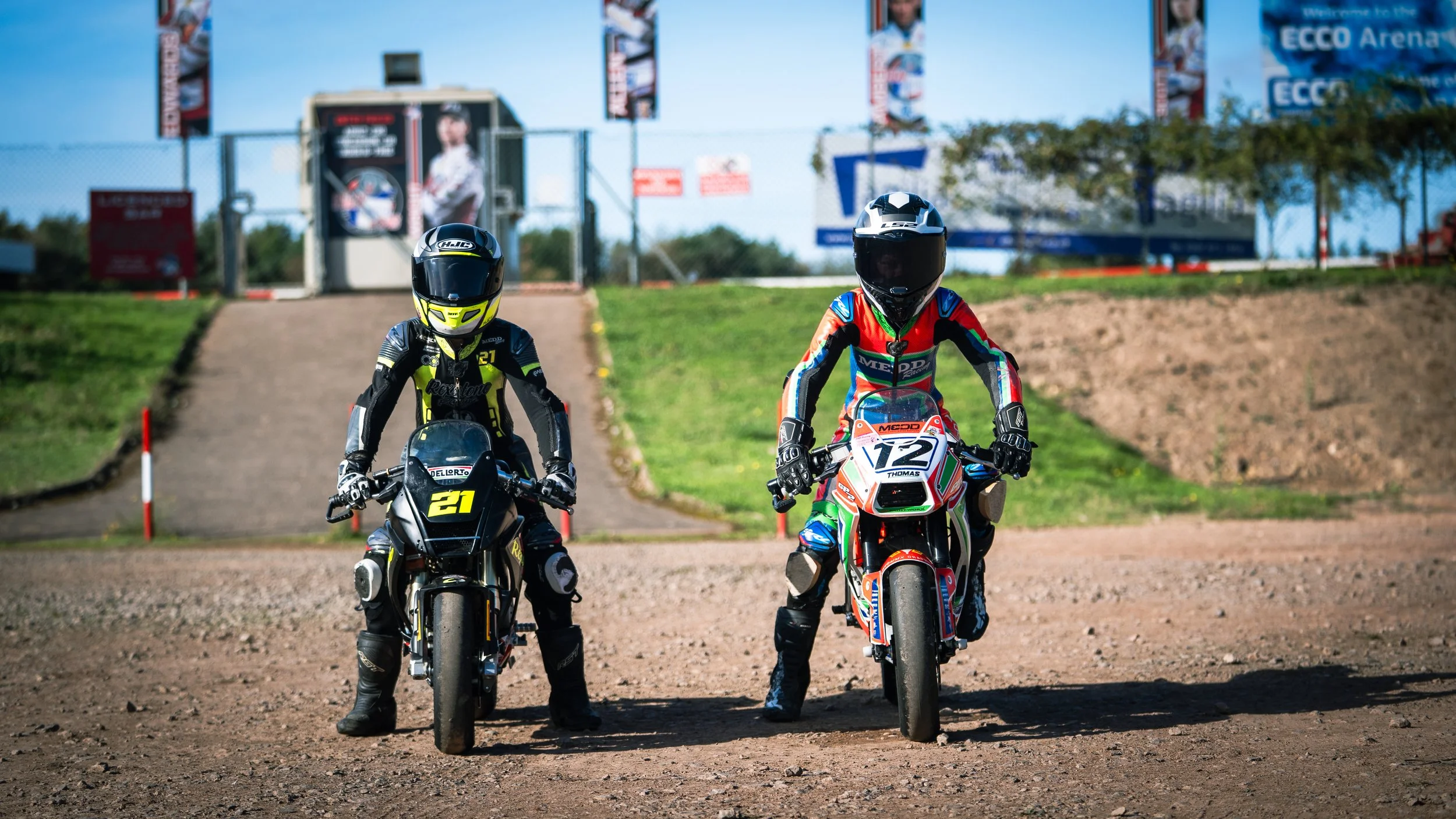 2 Supermoto riders posing for a pre race shot