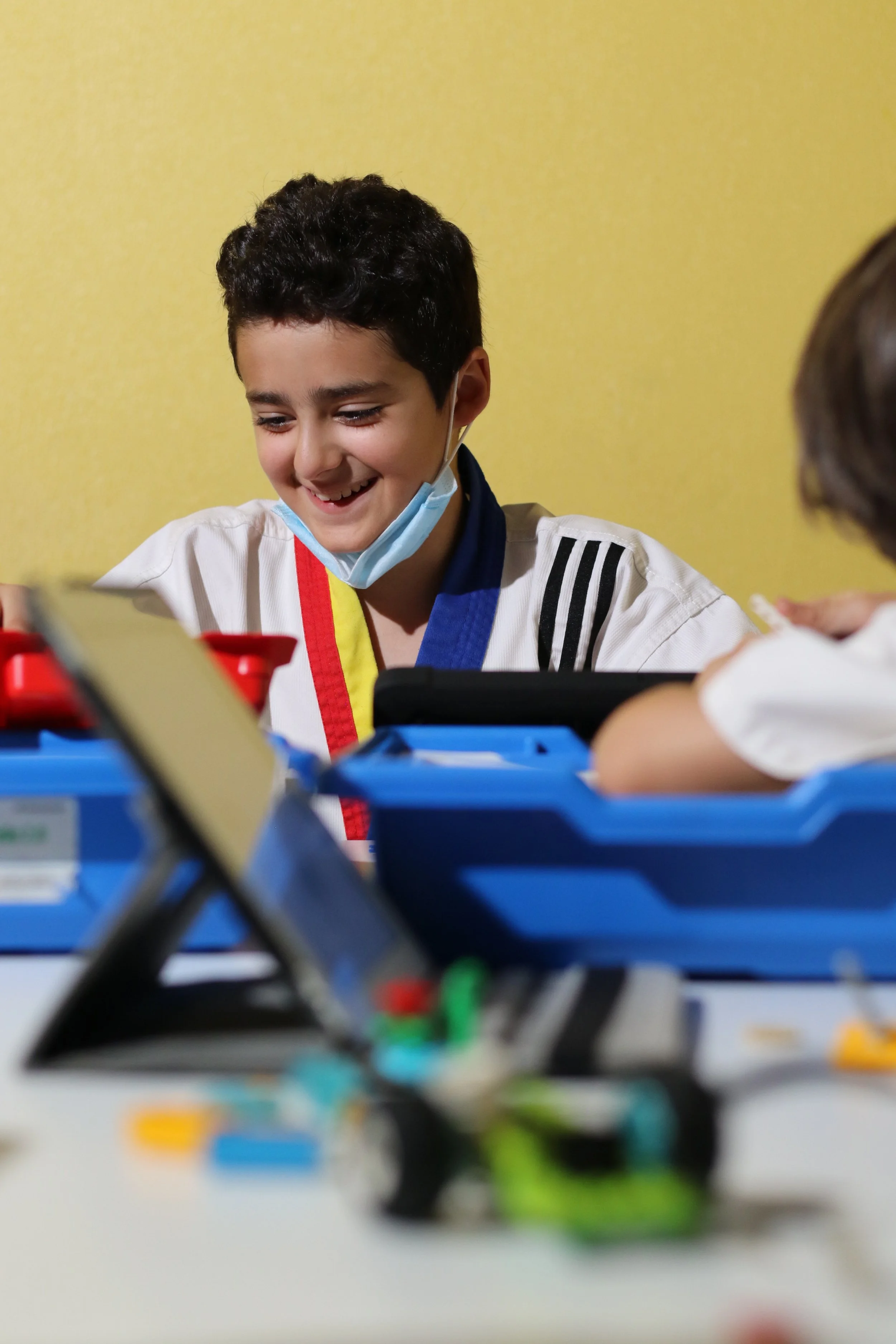 Boy coding on a tablet at Cranium