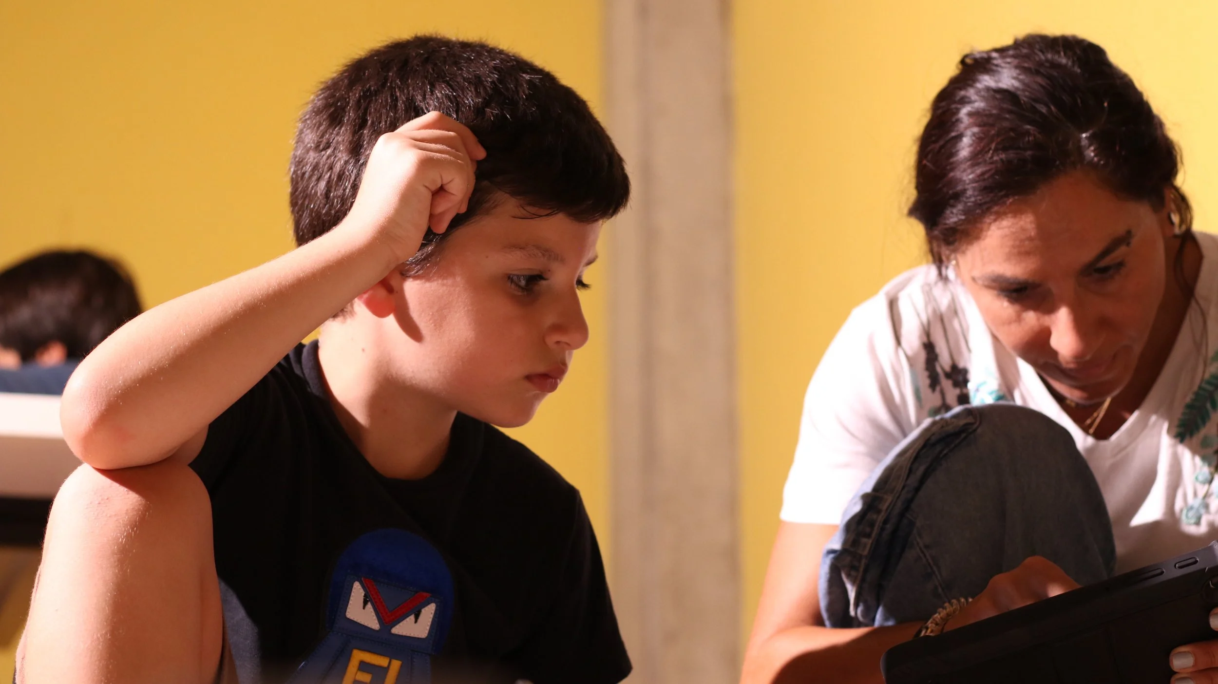 Kids learning to code together at Cranium