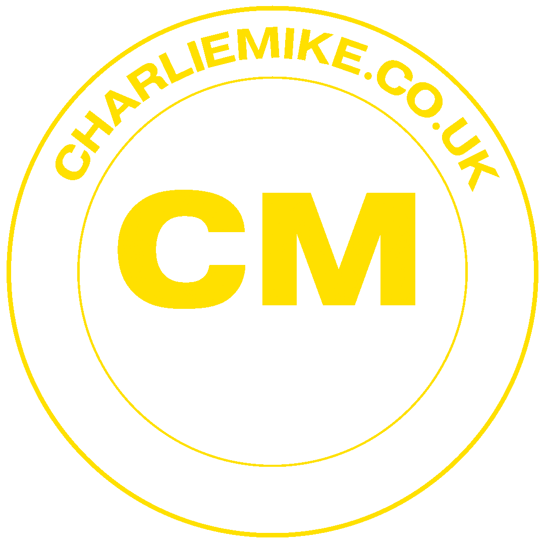A circular logo with a black background, yellow and white text. The outer ring has the website 'CHARLARIKIKE.CO.UK' at the top and 'DESIGN AGENCY ESSENX' at the bottom. Inside, the large yellow letters 'CM' are in the center, with the words 'WEB DESIGN' in white below.