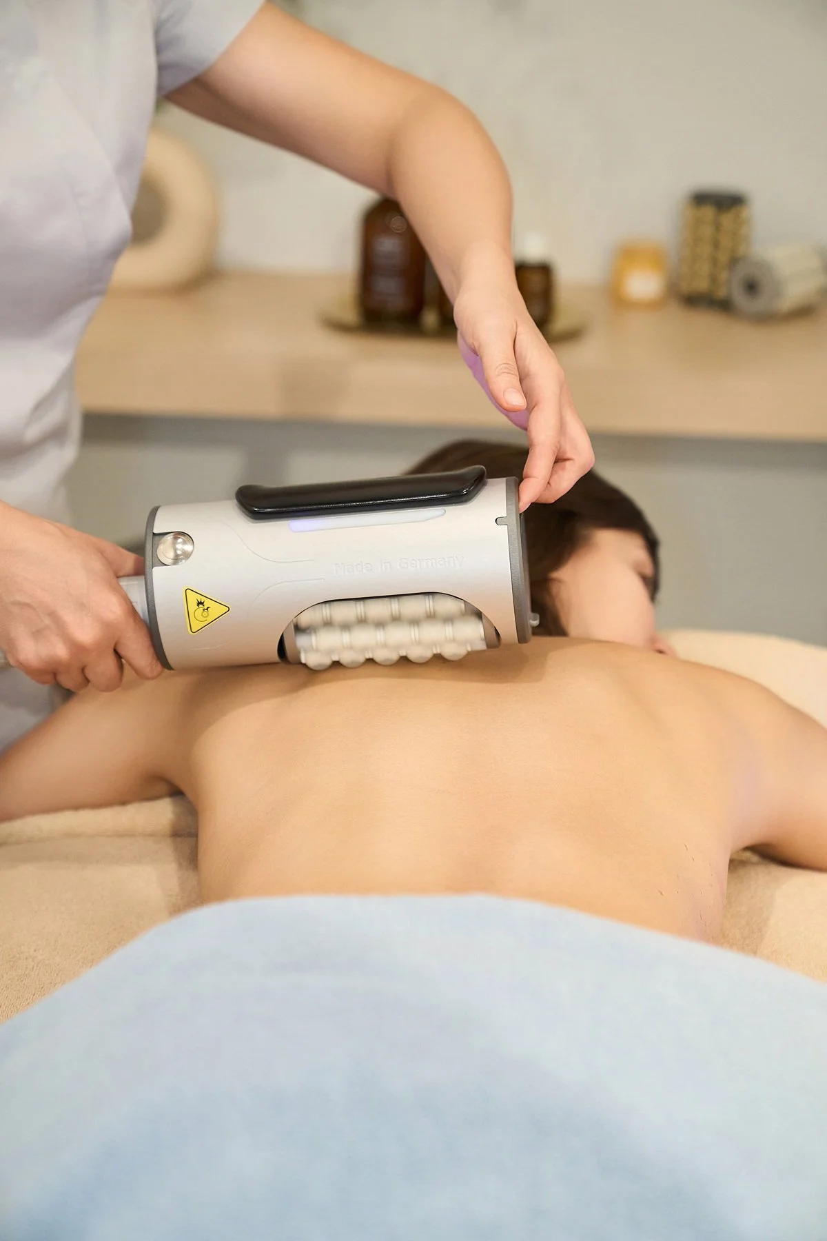 Professional body treatment at SENSO Skin Experts, offering body sculpting and massage in New York.