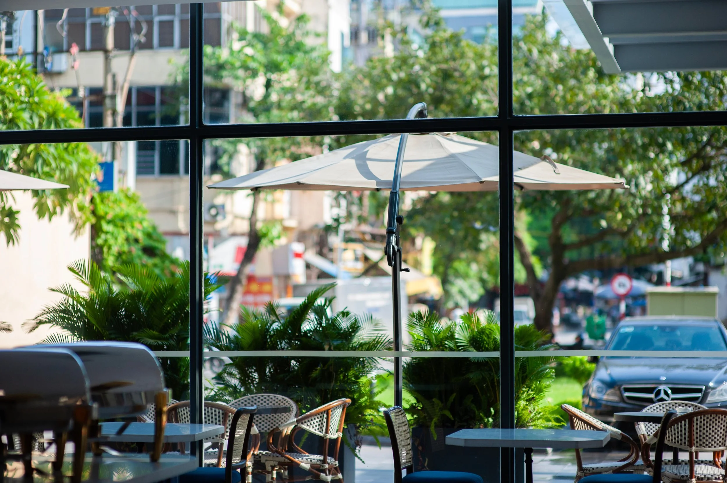 How Storefronts Can Cut Cooling Costs Without Blocking Their Display Windows