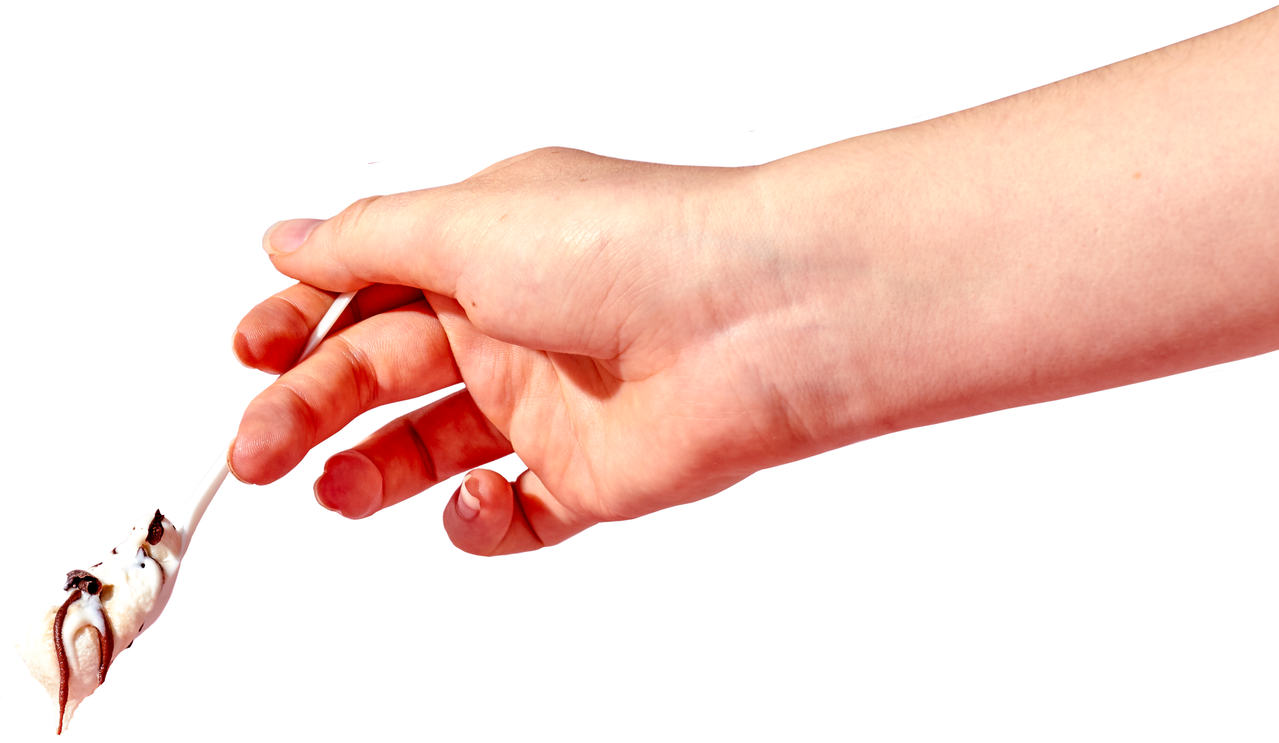 Hand using a cotton swab to touch or clean a small, model-like, ice cream cone with chocolate syrup and sprinkles.
