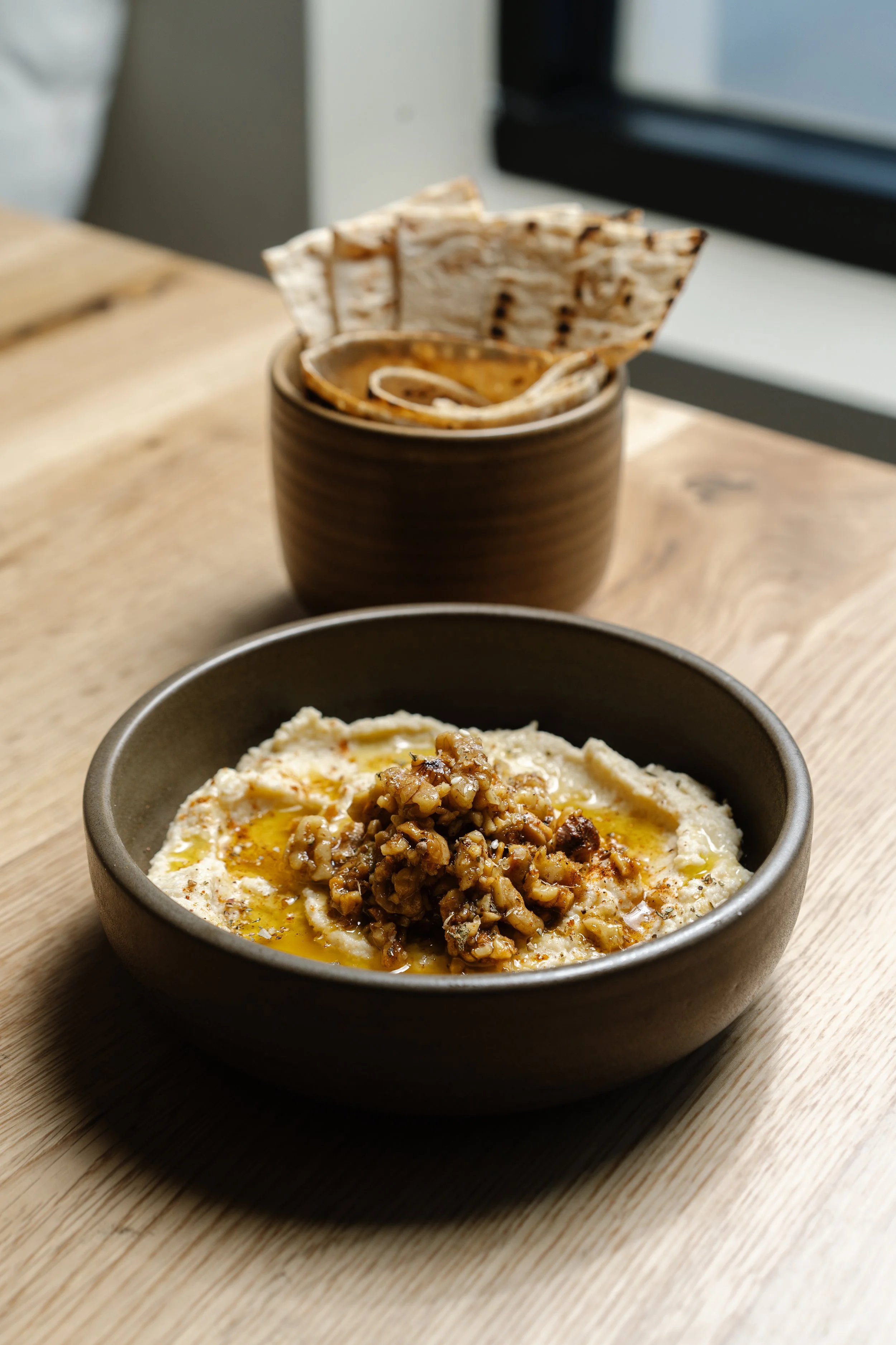Photo of the hummus at Topolino restaurant in Dover, New Hampshire, taken by seacoast restaurant and food photographer Katherine Keenan.