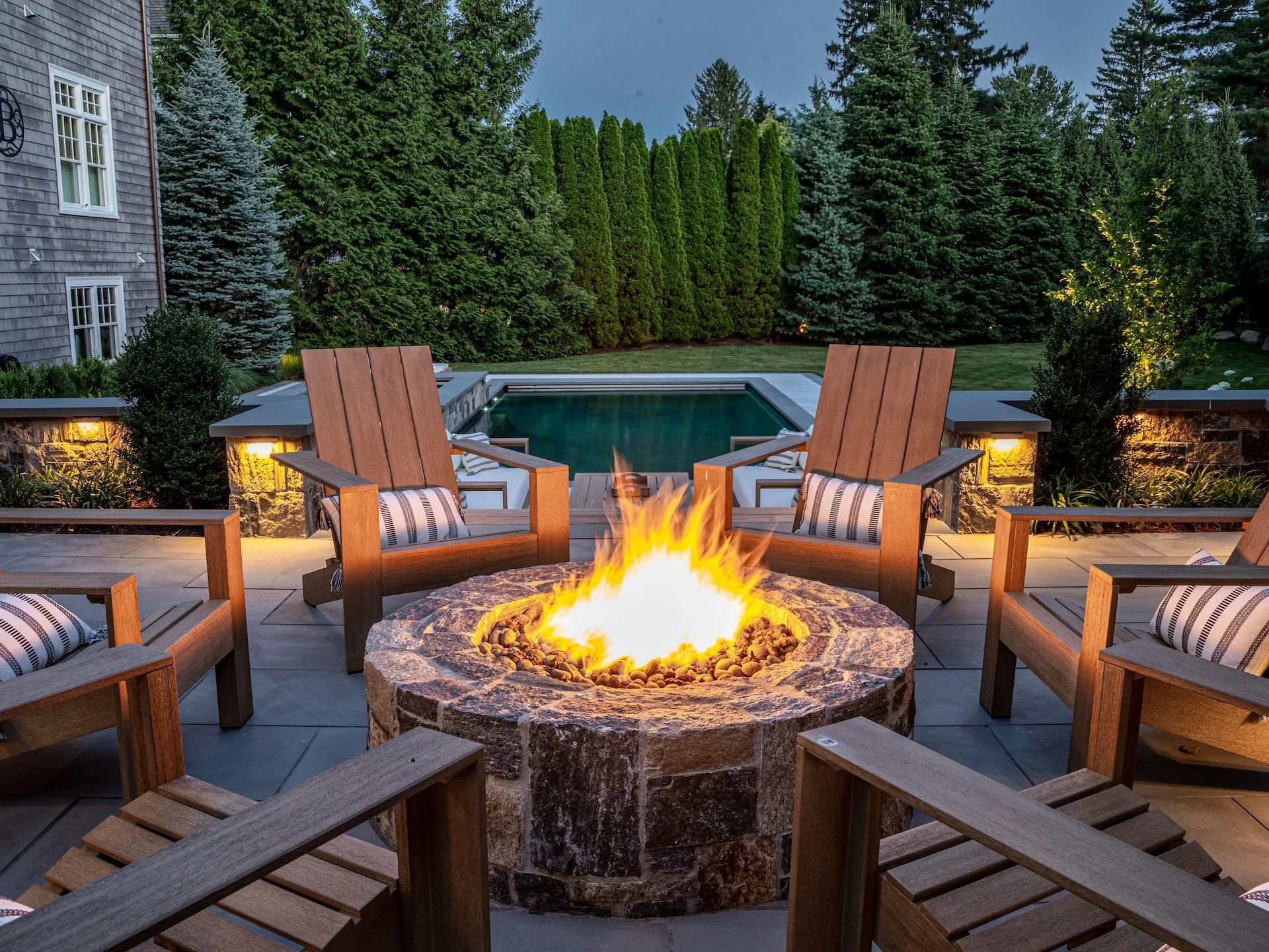 Designing Outdoor Experiences: Landscape Design &amp; Fire Pit Trends in Sudbury, MA, for Entertaining and Comfort