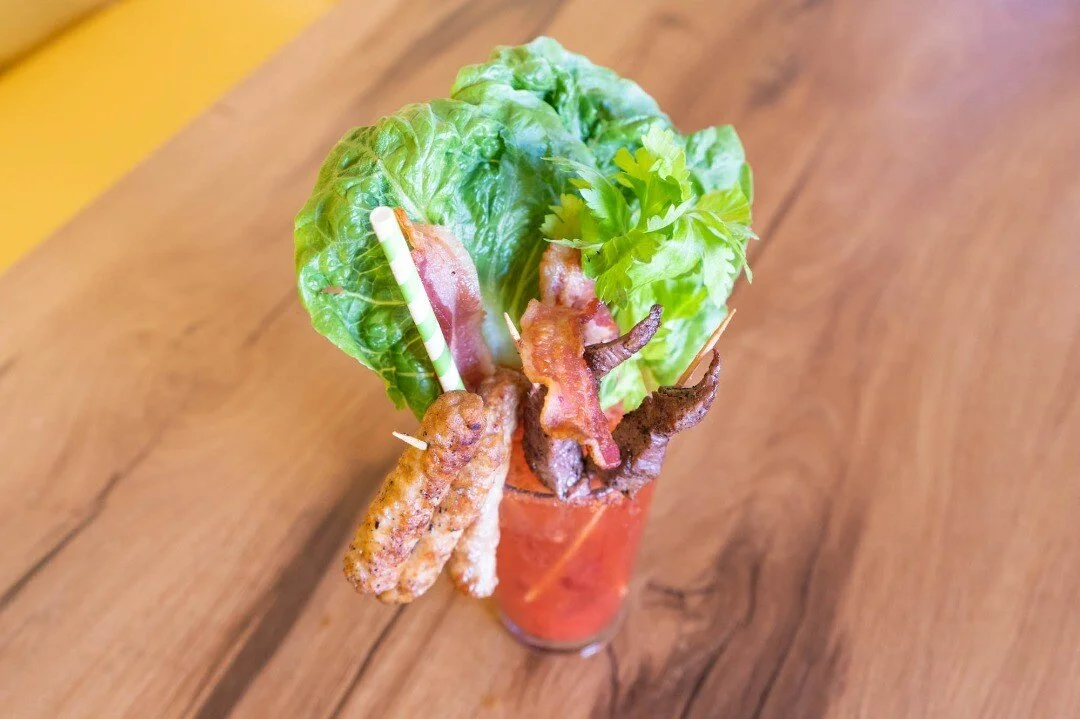 Check out our signature Bloody Mary for Meat Lovers - Bloody Mary mix / lime / rice vodka / steak skewers / bacon / sausages.
#mondaymotivation #calibreakfast #bloodymary #cocktails #drinkme