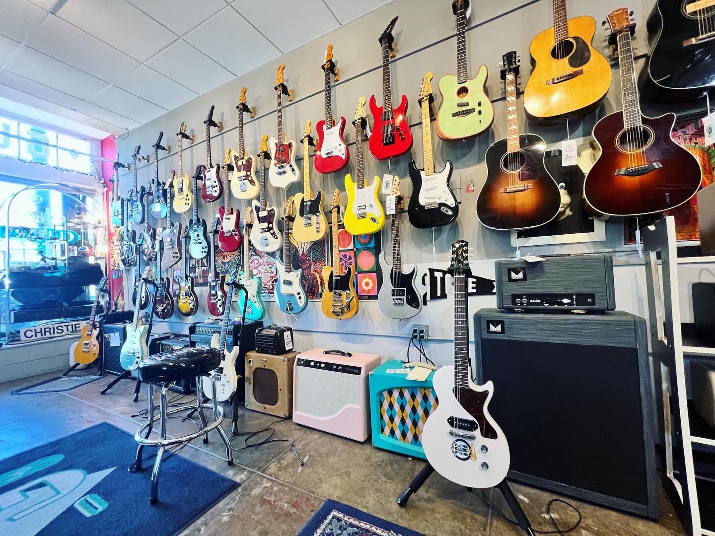All the pretty colors on The Wall! The Wall wants you to see them, meet them. All of them one The Wall! Some amps on sale too! #oaklandguitars