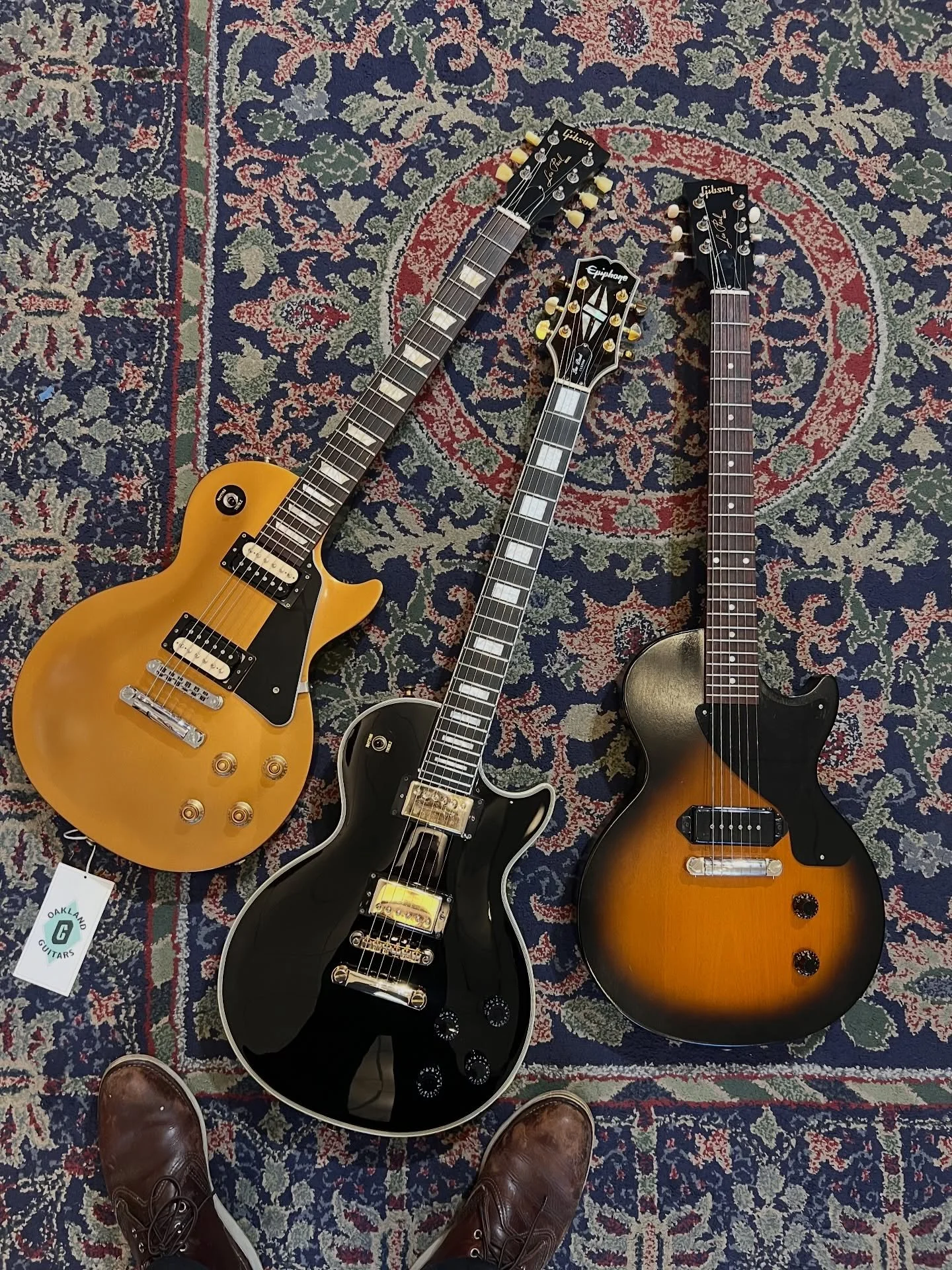 Some cool @gibsonguitar up on the wall! Solid and affordable models! Come play! #oaklandguitars #gibson #epiphone #lespaul