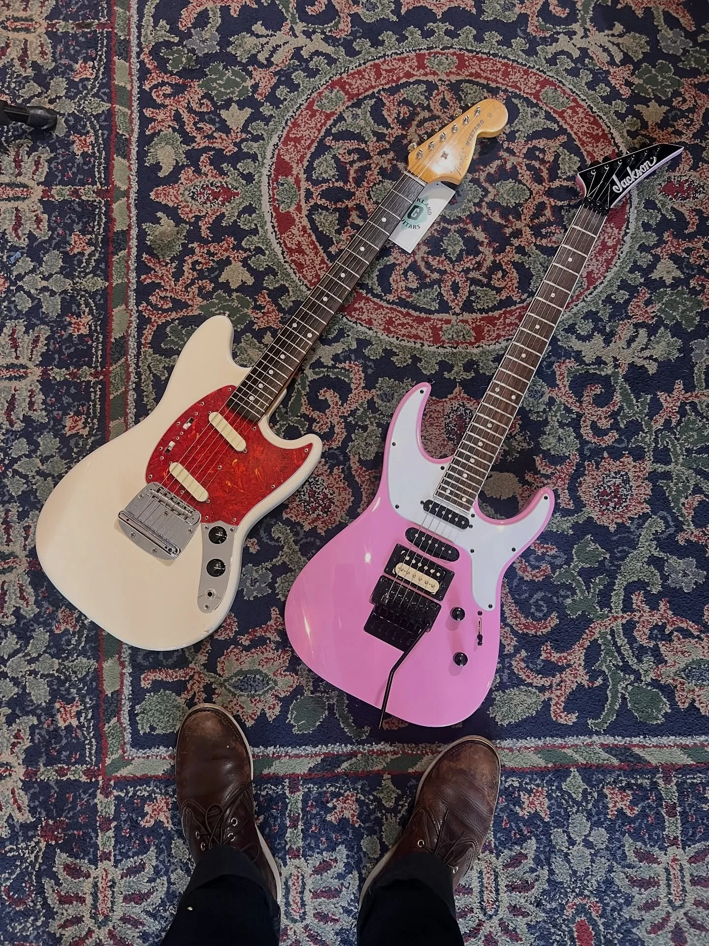 Let&rsquo;s do a fun one!! If you had to pick one, are you taking the @fender Mustang or the @officialjacksonguitars pink boi?! Hit the comments! #oaklandguitars