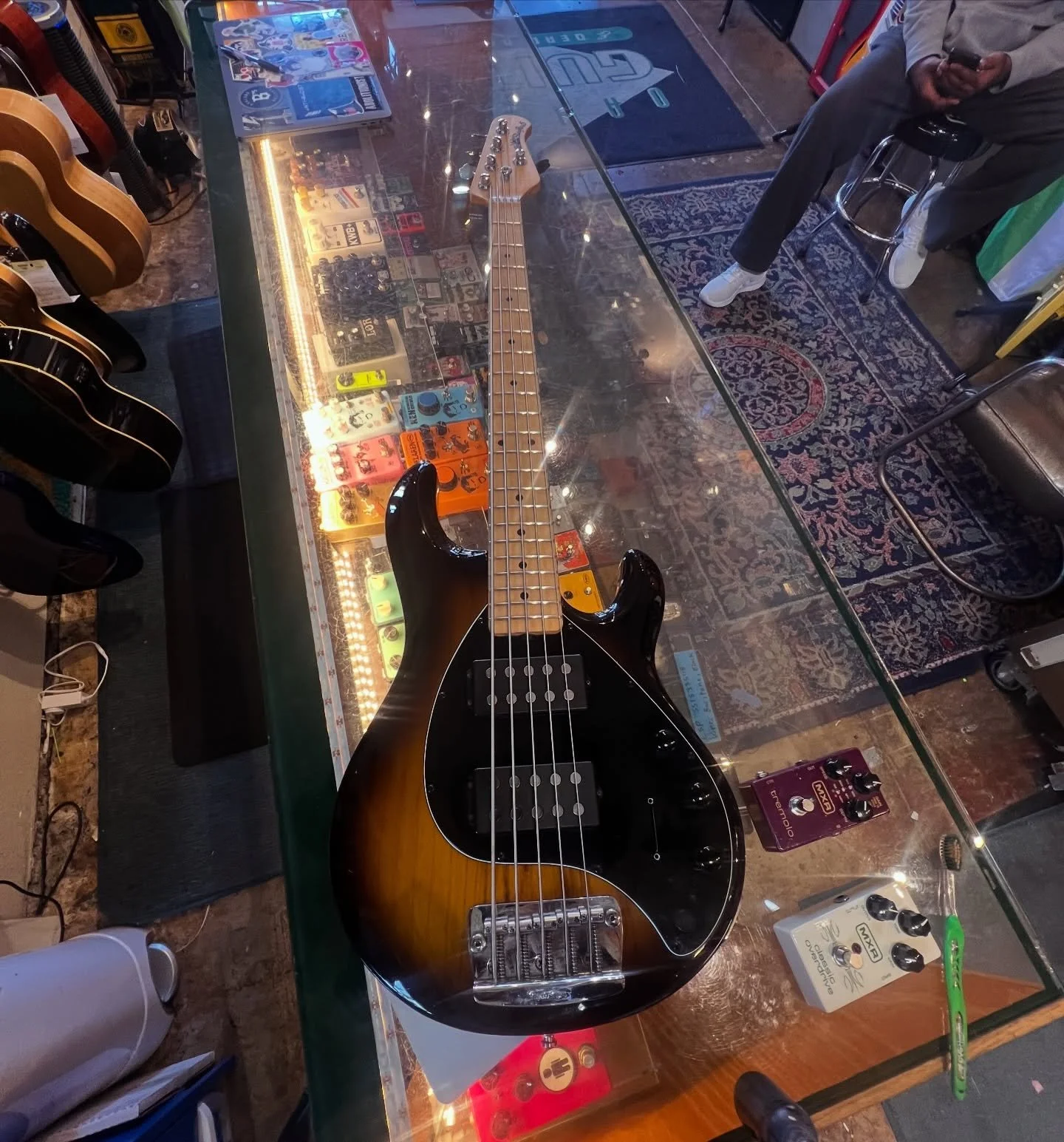 A pretty cool @music_man Stingray 5 hitting the wall! Come play! #oaklandguitars #musicman #stingray5