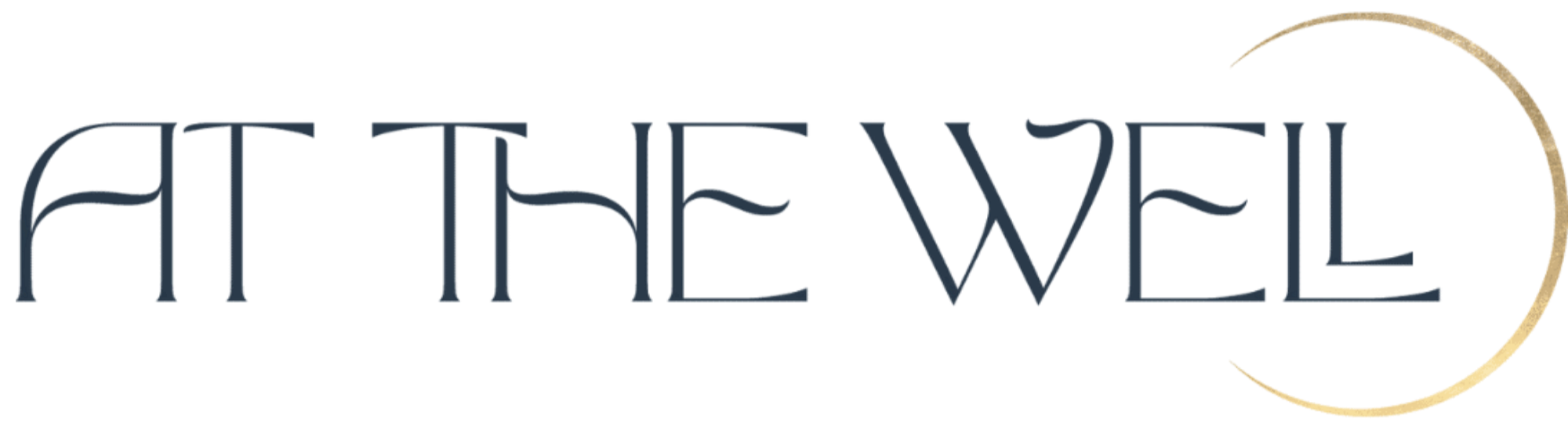 At The Well Logo in navy blue font with a crescent moon.
