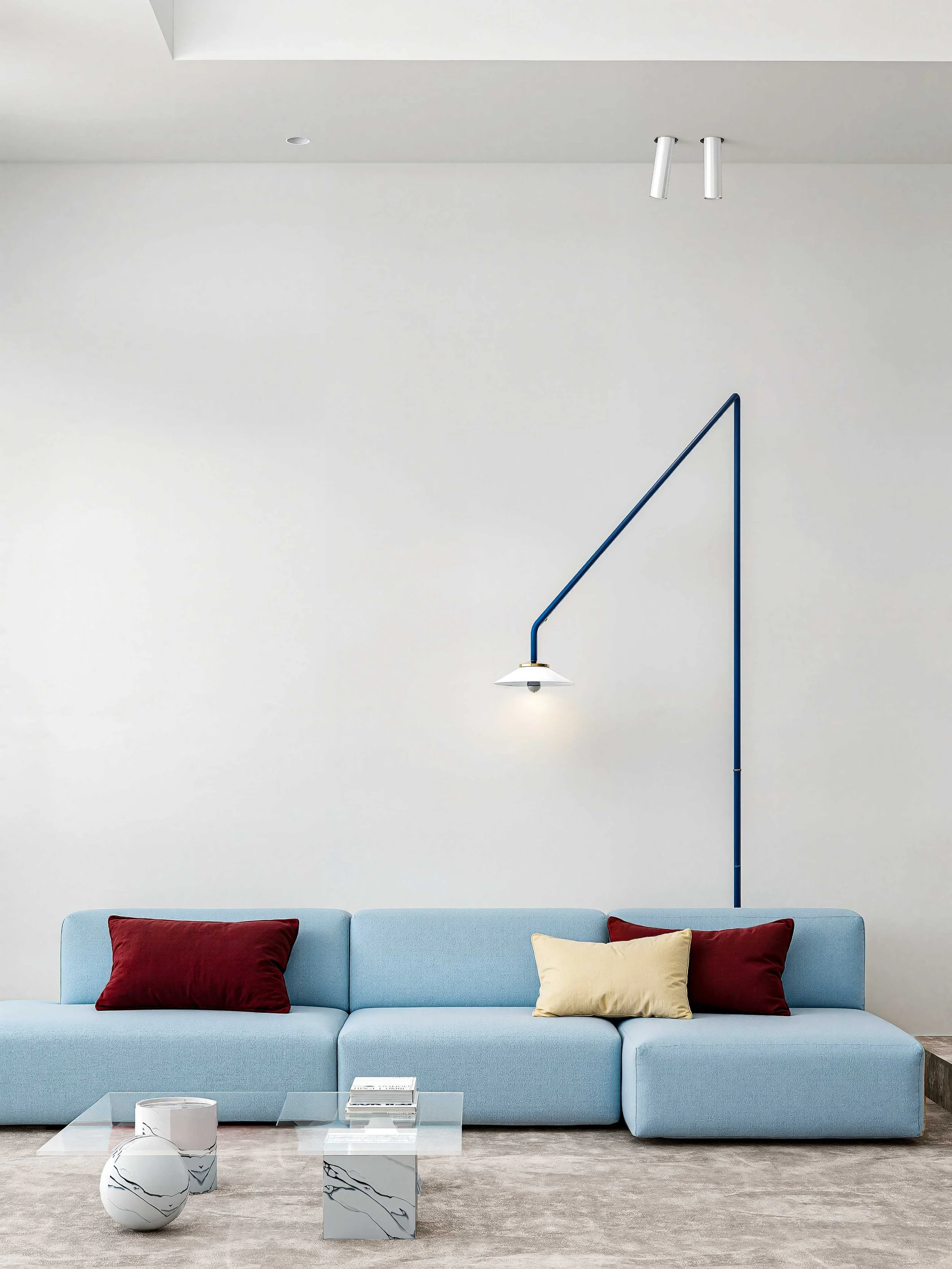 pastel colored living room with wall fixture