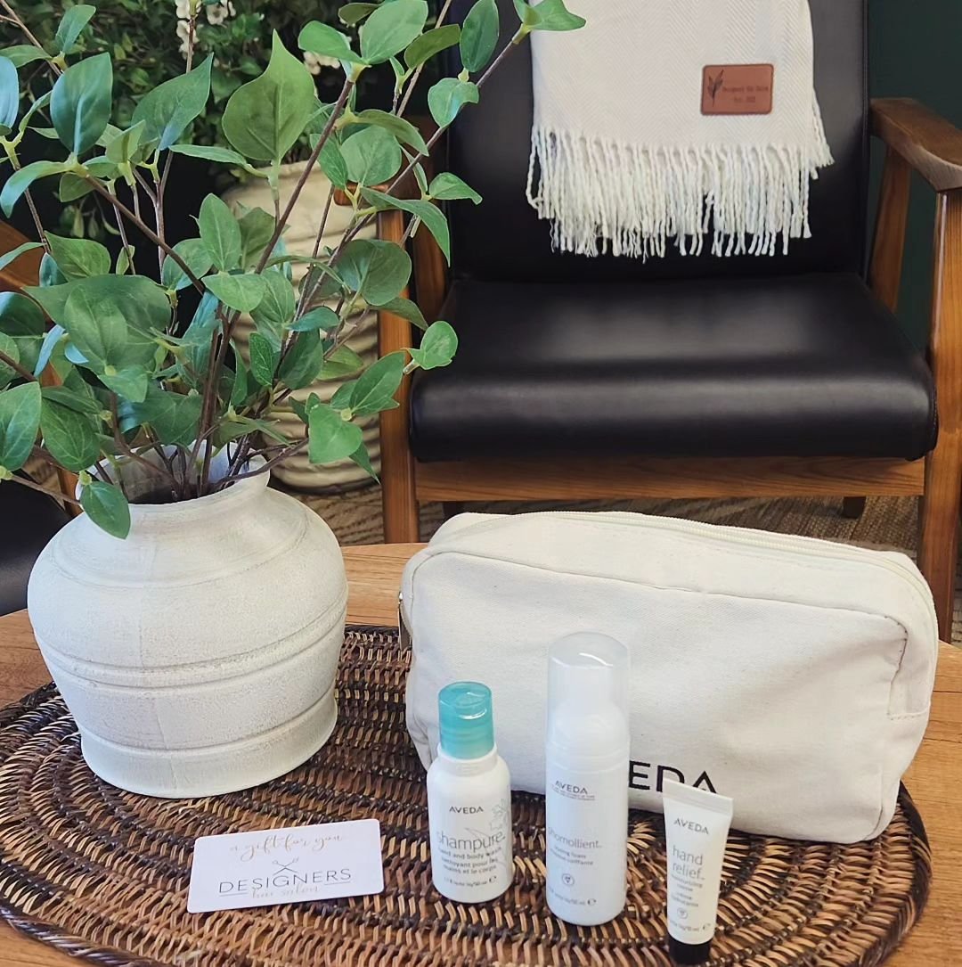 ✨️Mother's Day is coming! 🤗✨️
 Need gift ideas!? We have the perfect gift for her! 
Get a FREE Aveda bag filled with 3 amazing travel size products with a purchase of a $75 Designers Gift card! 🎁 🎉 

**Happening now until May 31st, or while suppli