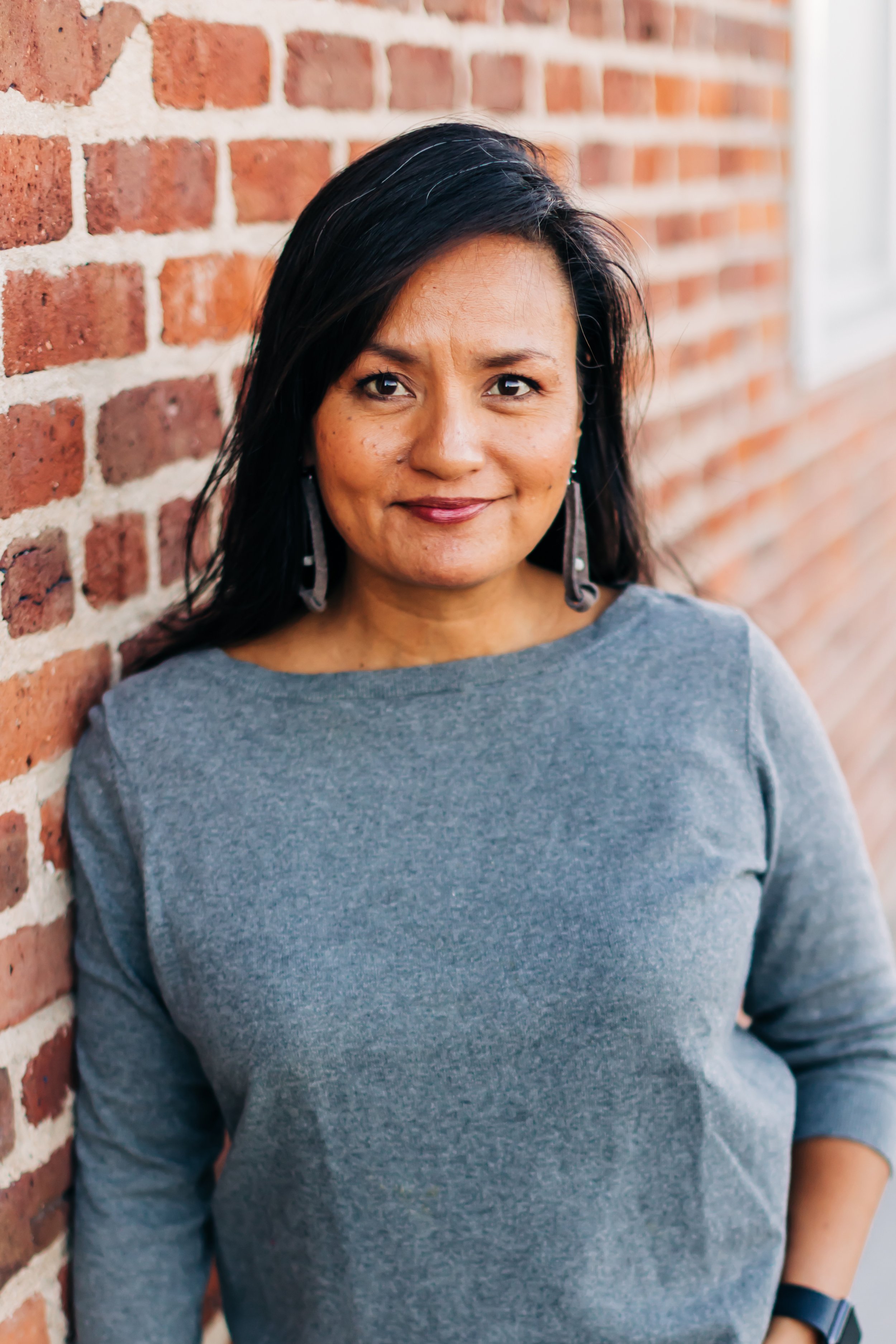 Annelyn Aficial smiling at the camera