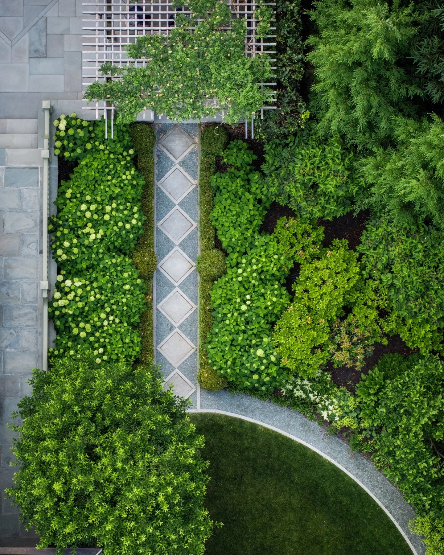 A very special garden path, as seen from above and below!
 
Project team includes:
@dangordonla 
@rpmarzillilandscape 
@jan_gleysteen_architects 
@mfreynoldsbuilders 
@perfectionfence 
 
#landscapearchitecturalphotographer #landscapearchitecturalphot