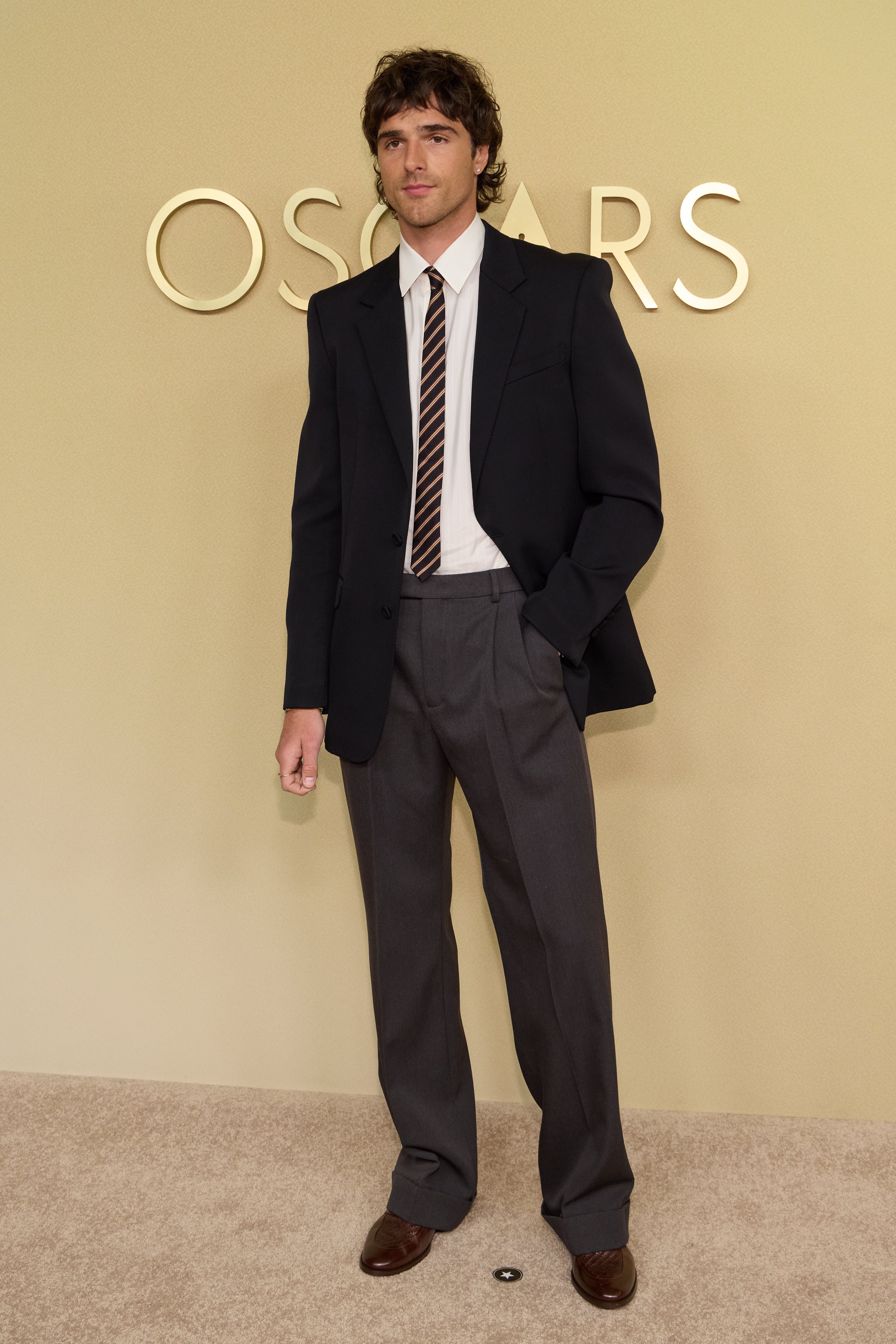 Jacob Elordi in a custom Valentino suit and narrow tie at the 98th Oscars Nominees Luncheon, Beverly Hilton.