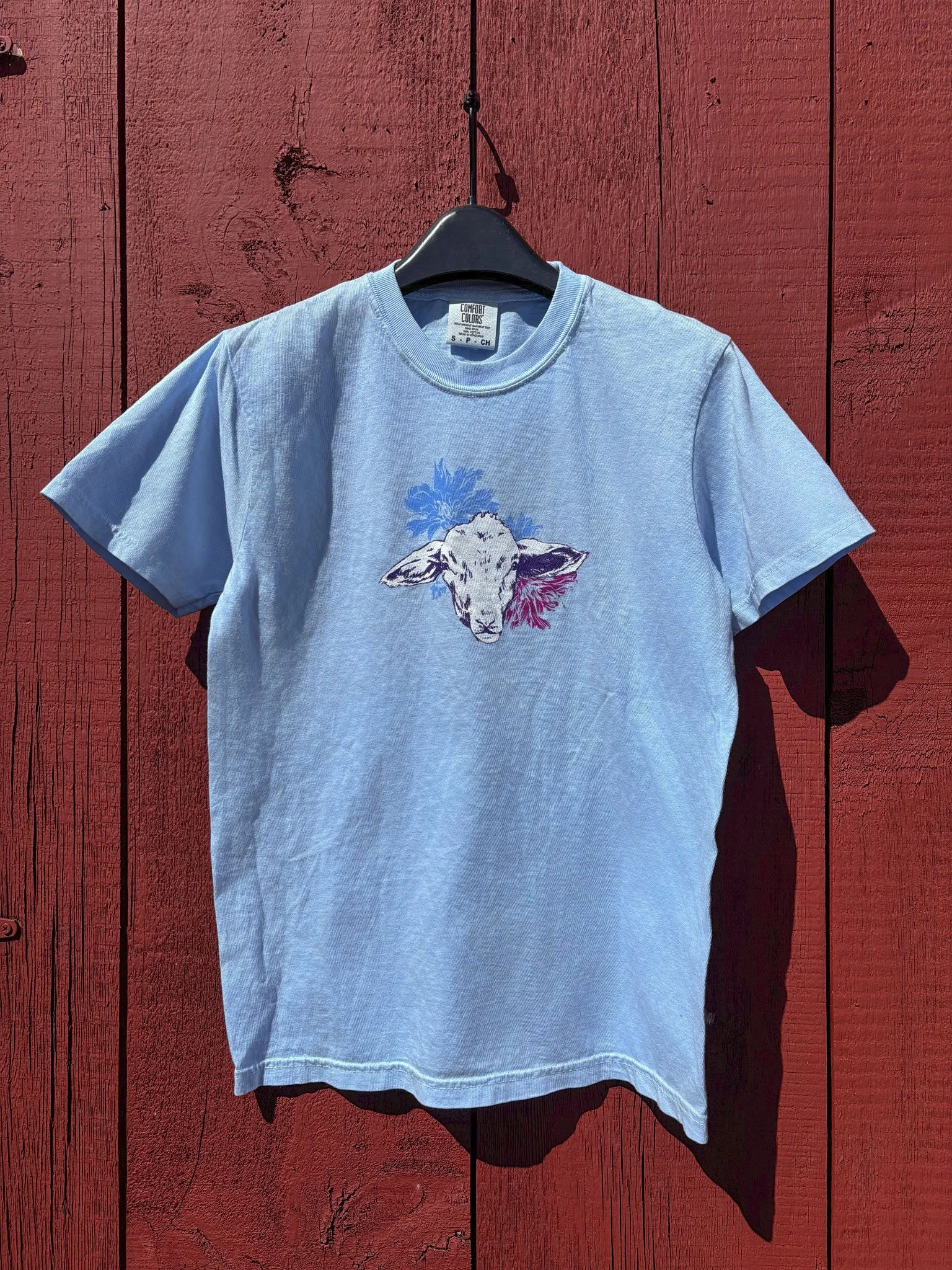 Sheep with flowers short sleeve.jpg