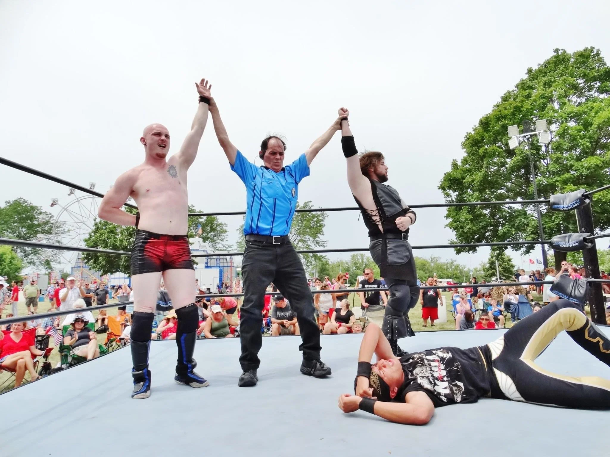 winners-ref-raise-hands.jpg