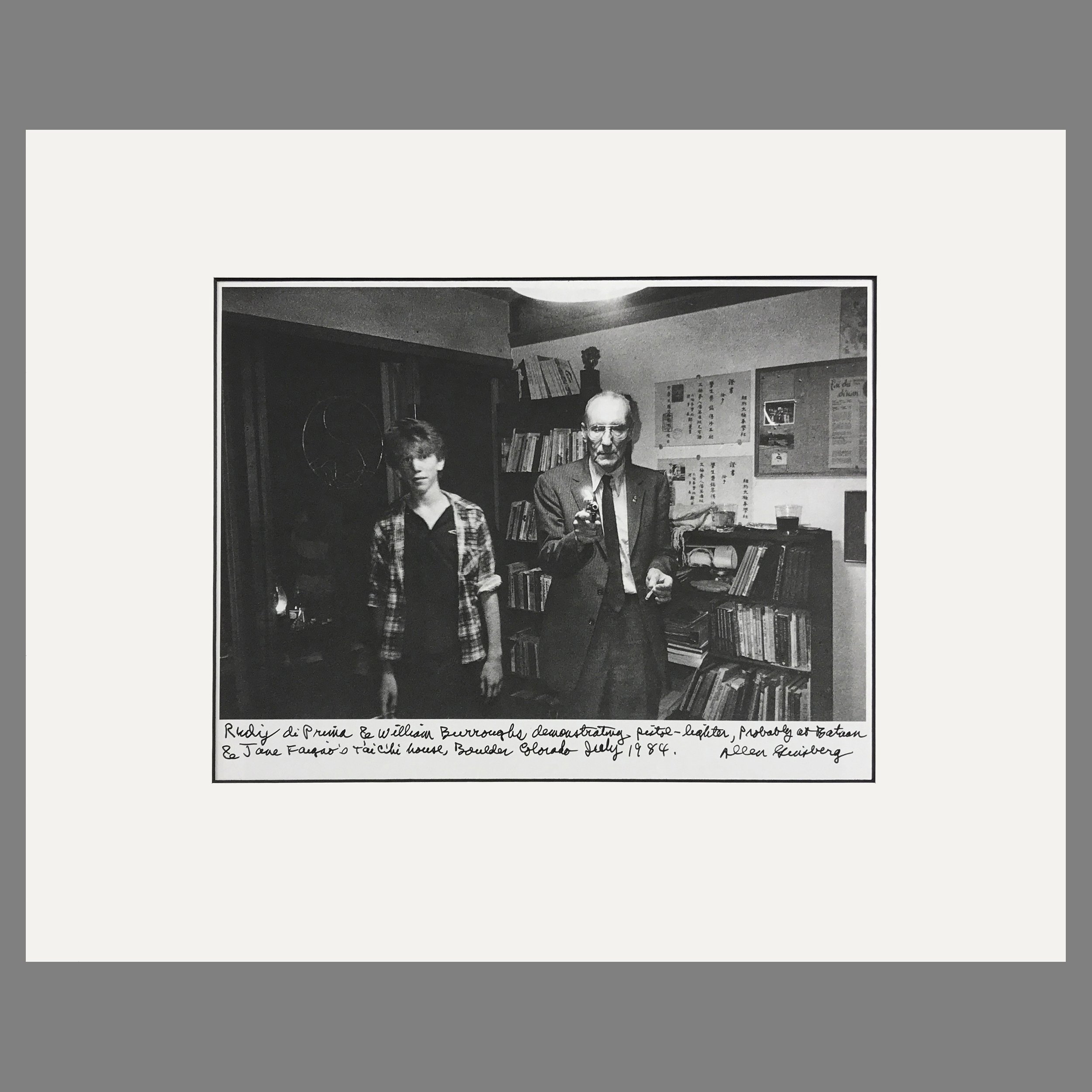 William Burroughs Demostrating a Pistol Lighter - Allen Ginsburg Photograph - Matted Print 16 x 20