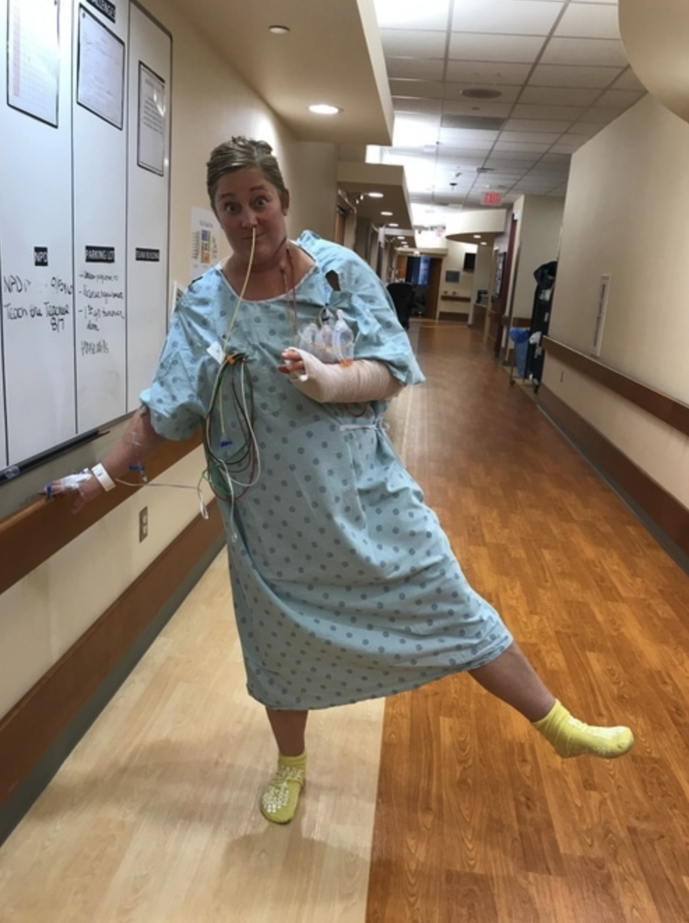 walking down hallway of hospital after mouth surgery